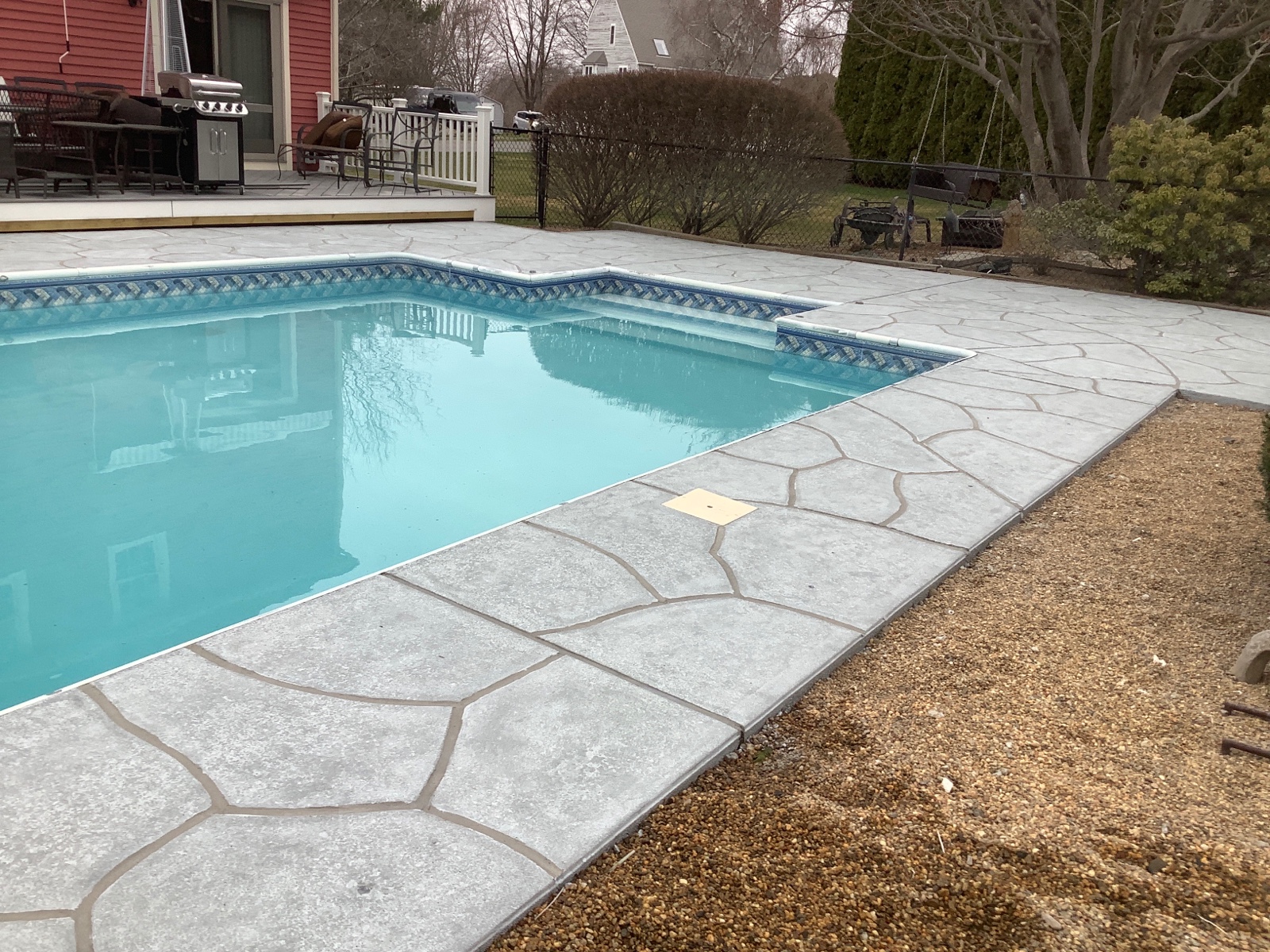 Granite Boulder concrete pool deck repair featuring textured stone surface in Annapolis, MD