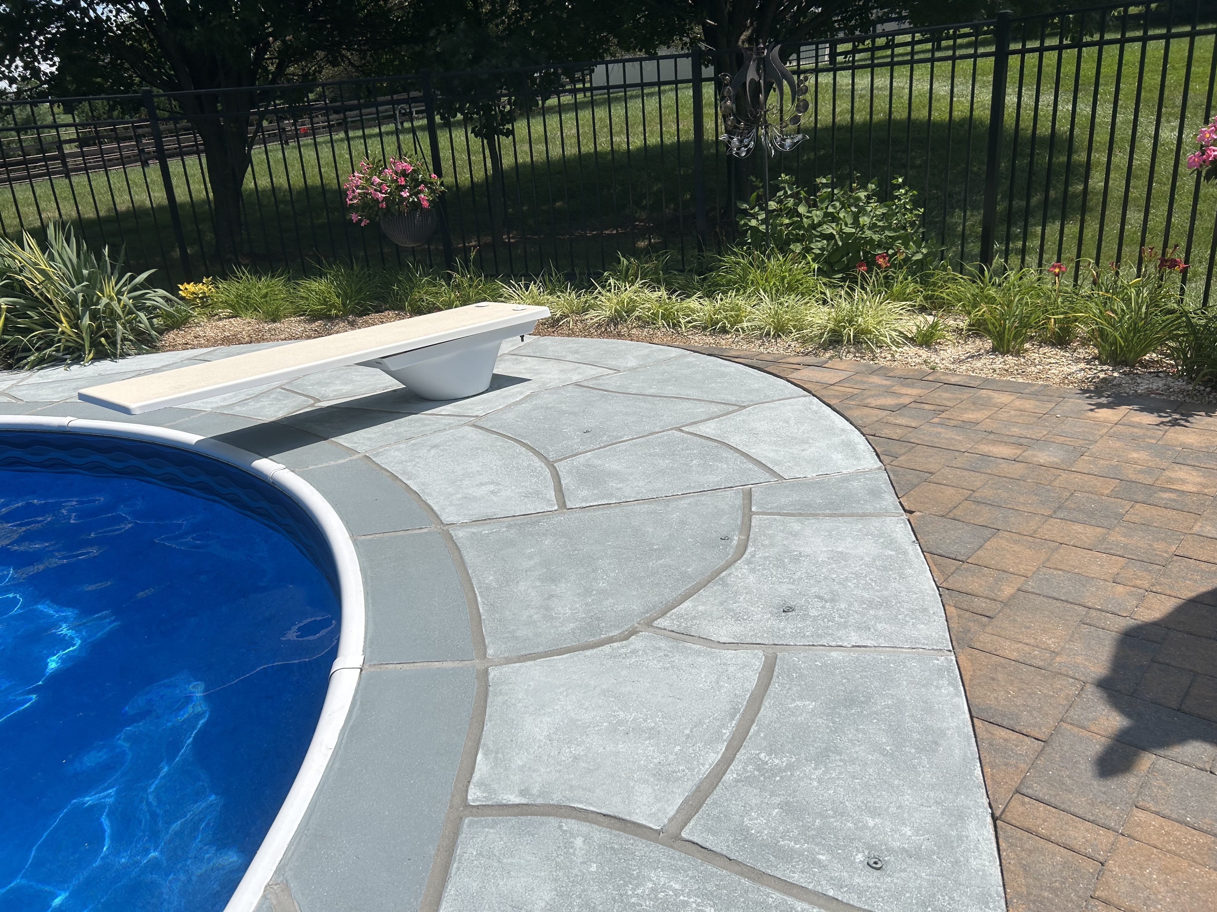 Granite Boulder concrete pool deck repair featuring bold granite-style aesthetic