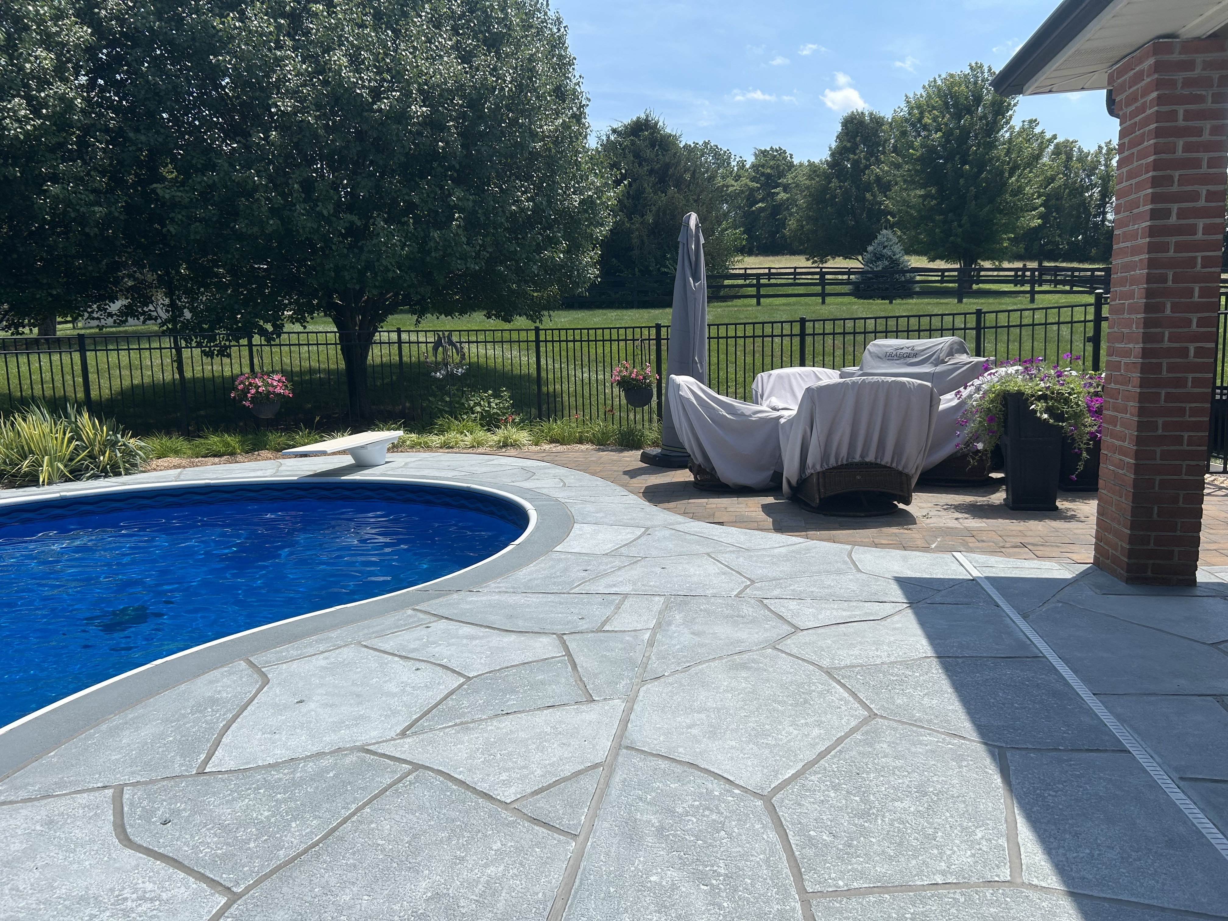 Granite Boulder concrete pool deck repair featuring rugged stone-like texture