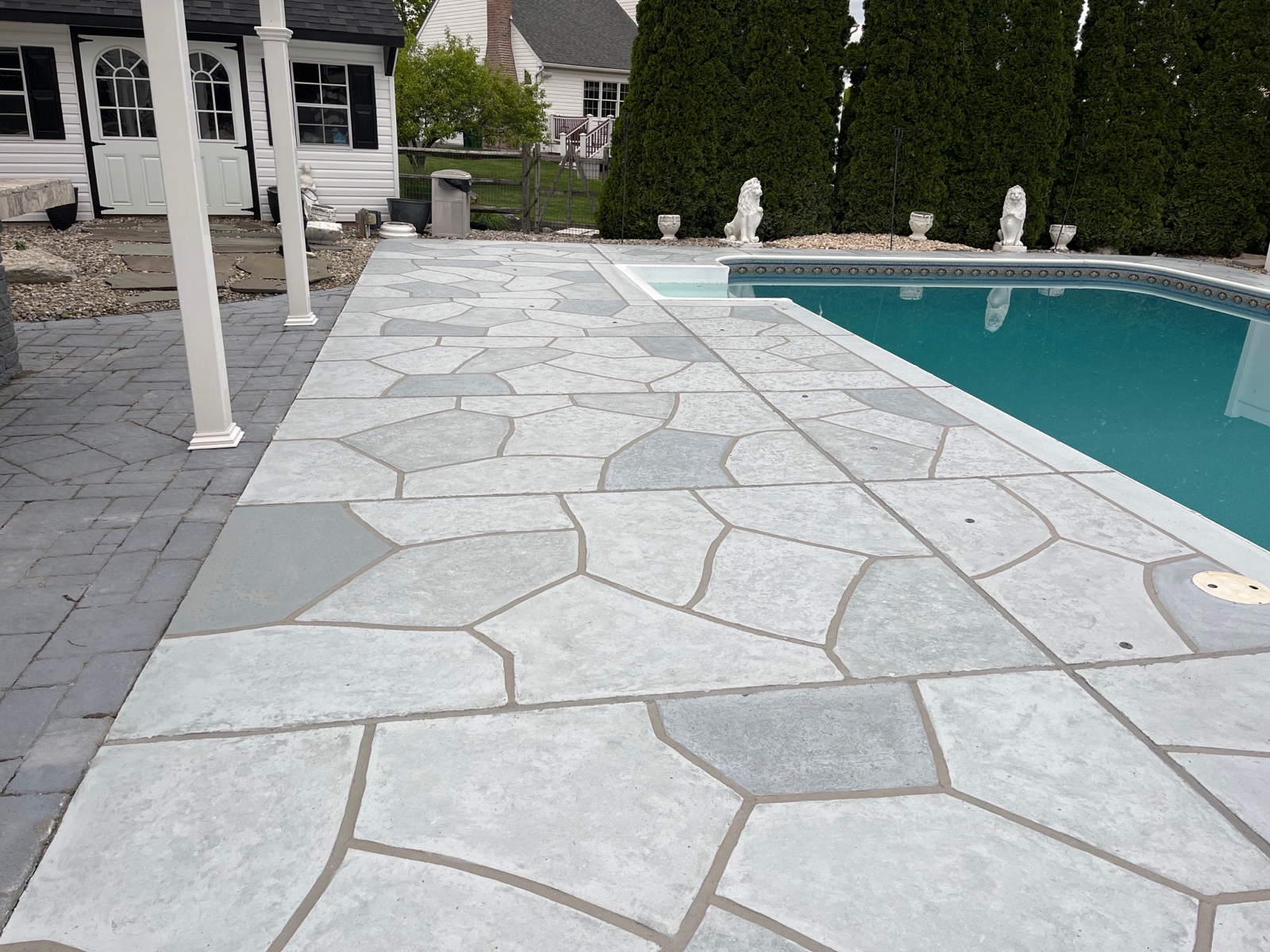Granite Boulder pool deck renovation displaying natural boulder-inspired appearance