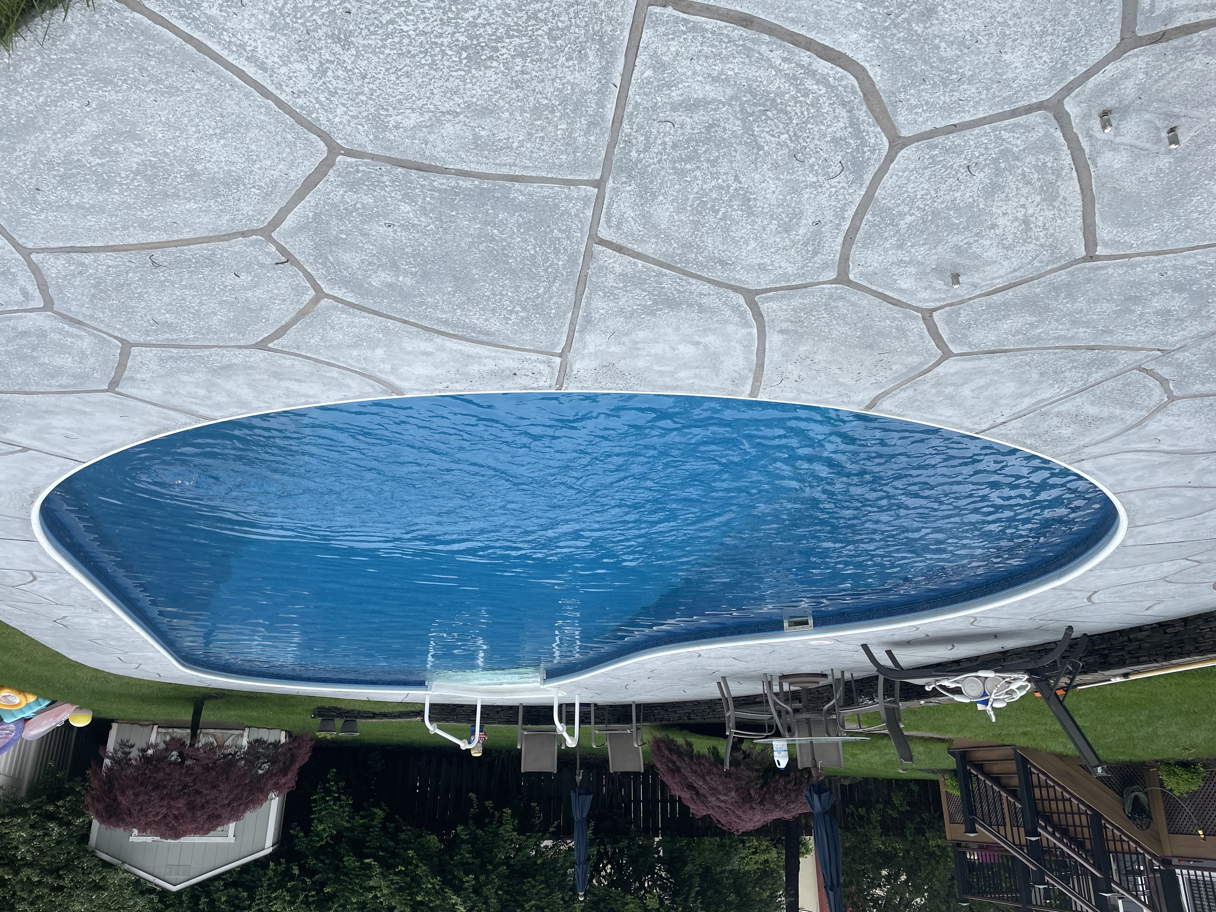 Granite Boulder concrete pool deck repair featuring textured stone surface in Warwick, RI