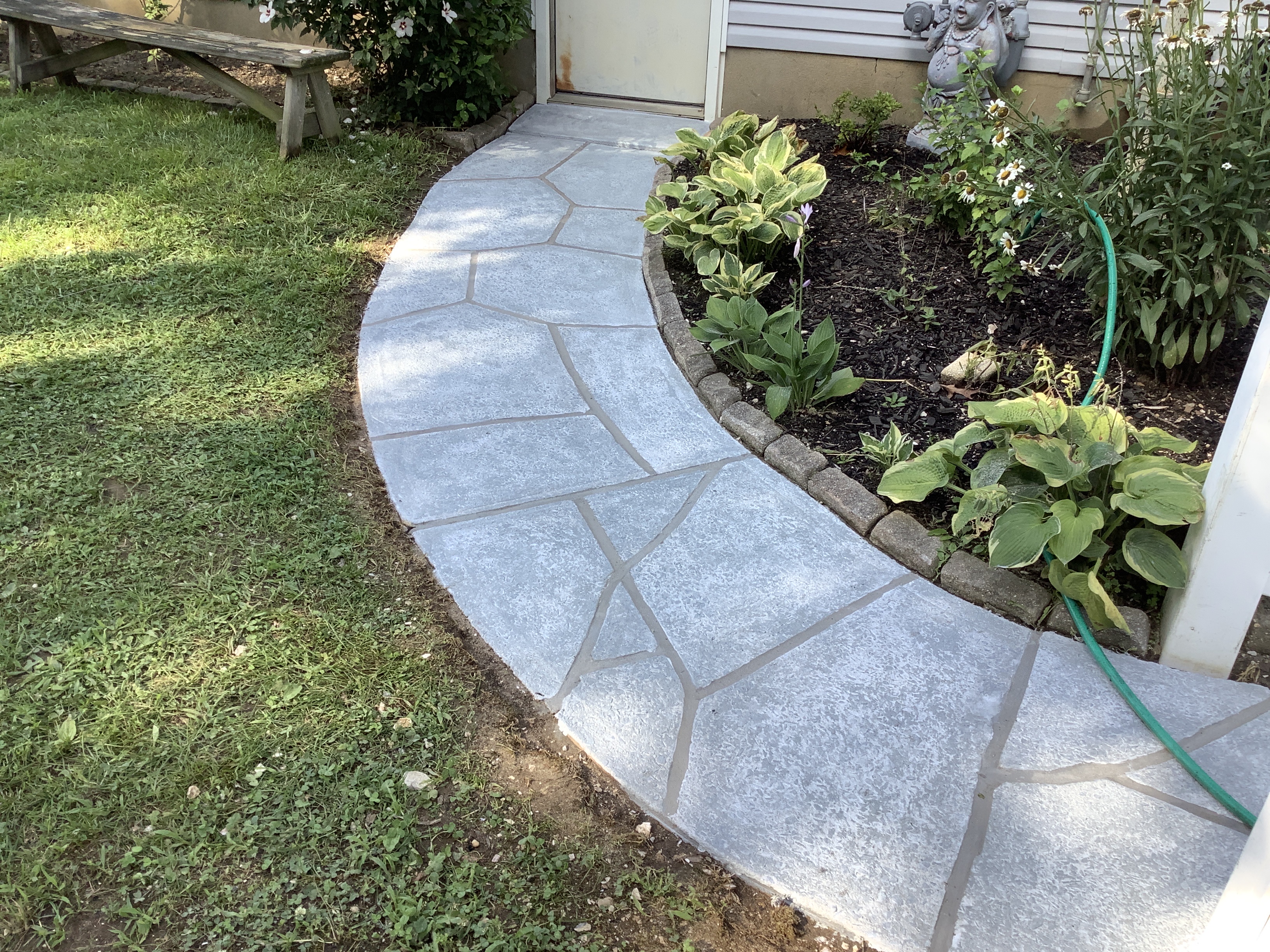Granite Boulder concrete pool deck repair featuring durable resurfaced concrete