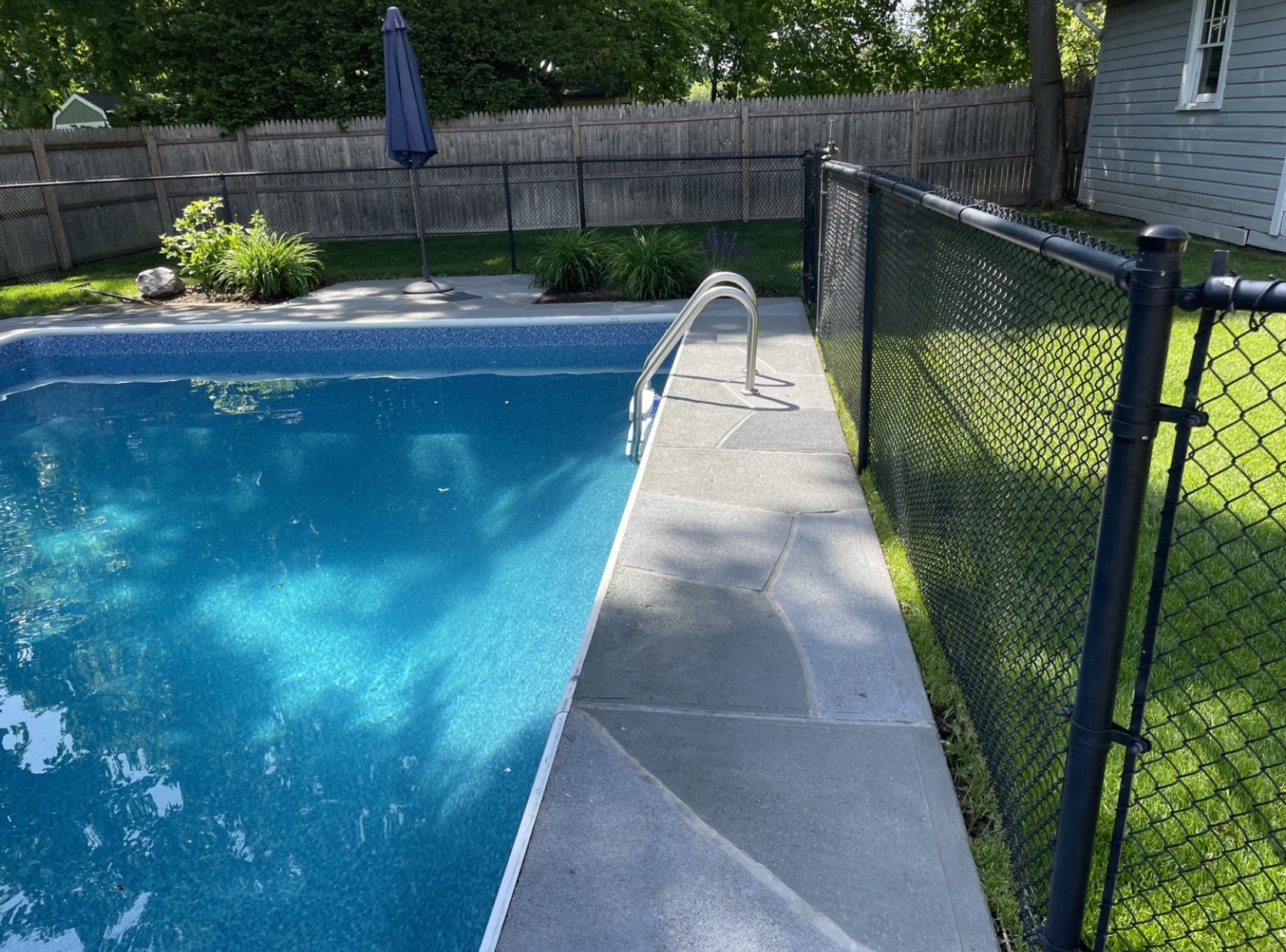 Granite Slate pool deck concrete resurfacing project in Summit, NJ with refined slate like texture.