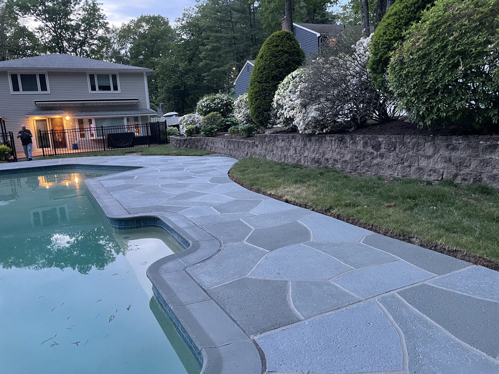 Granite Slate pool deck concrete repair and resurfacing project in Stamford, CT.