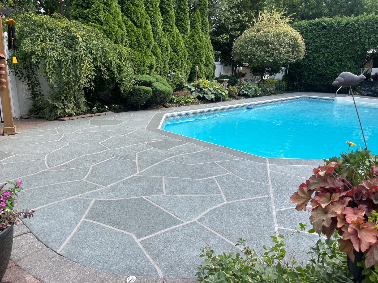 Granite Slate decorative concrete pool deck surface with stone inspired pattern.