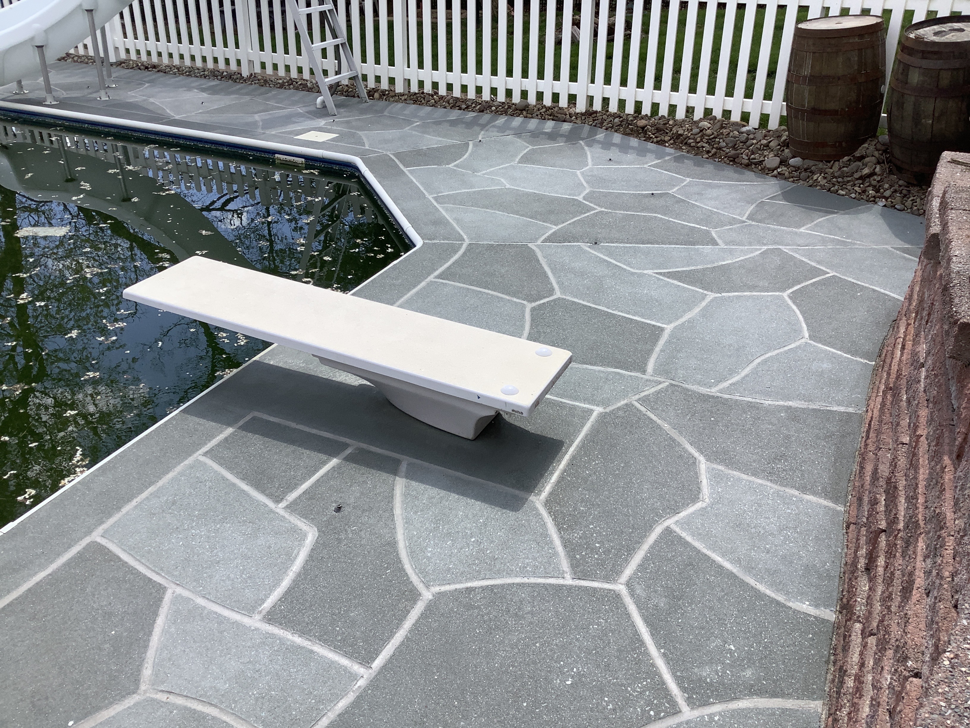 Granite Slate pool deck concrete resurfacing project in Rockville, MD with refined slate like texture.