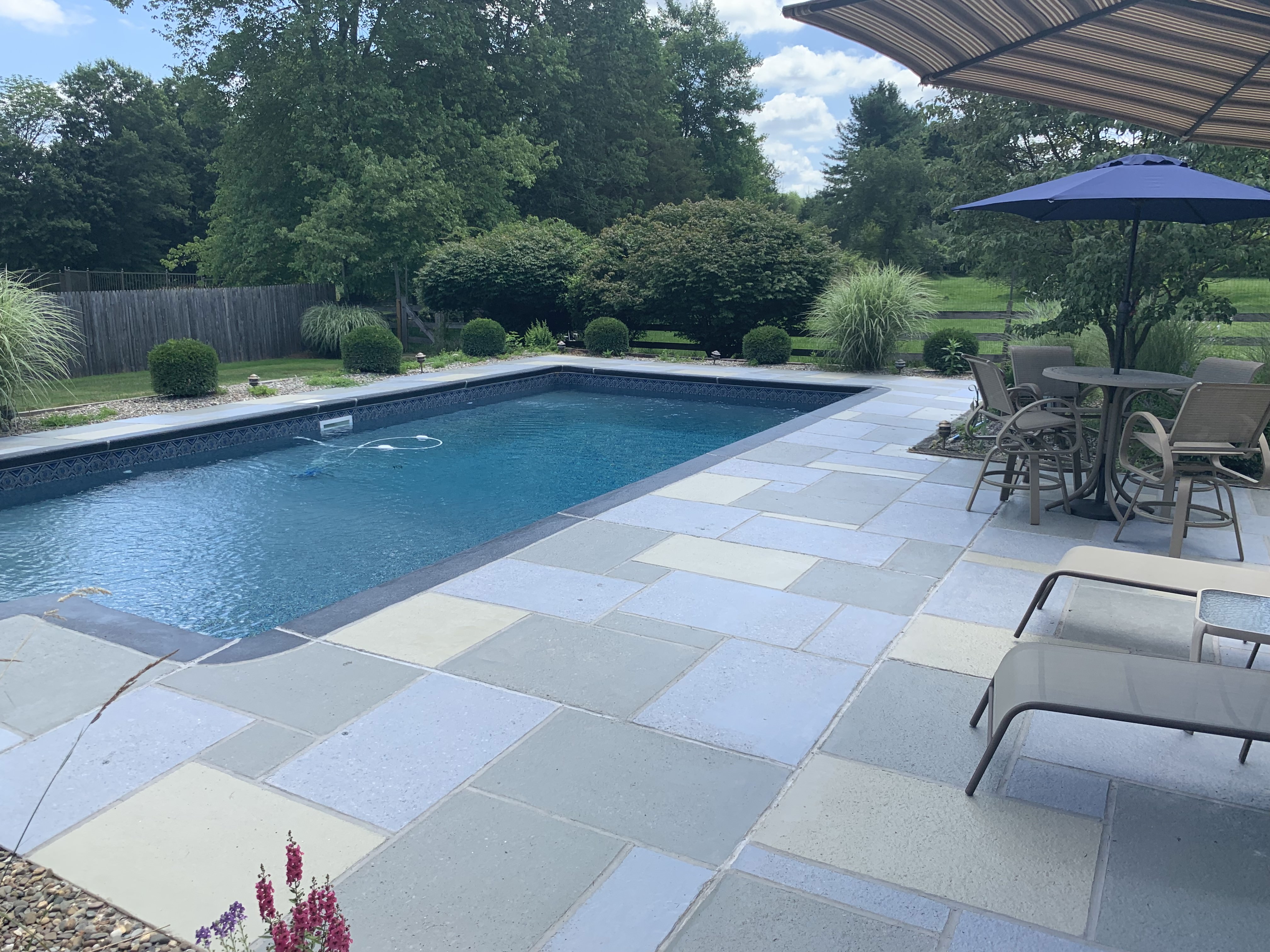 Granite Slate pool deck concrete repair and resurfacing project.