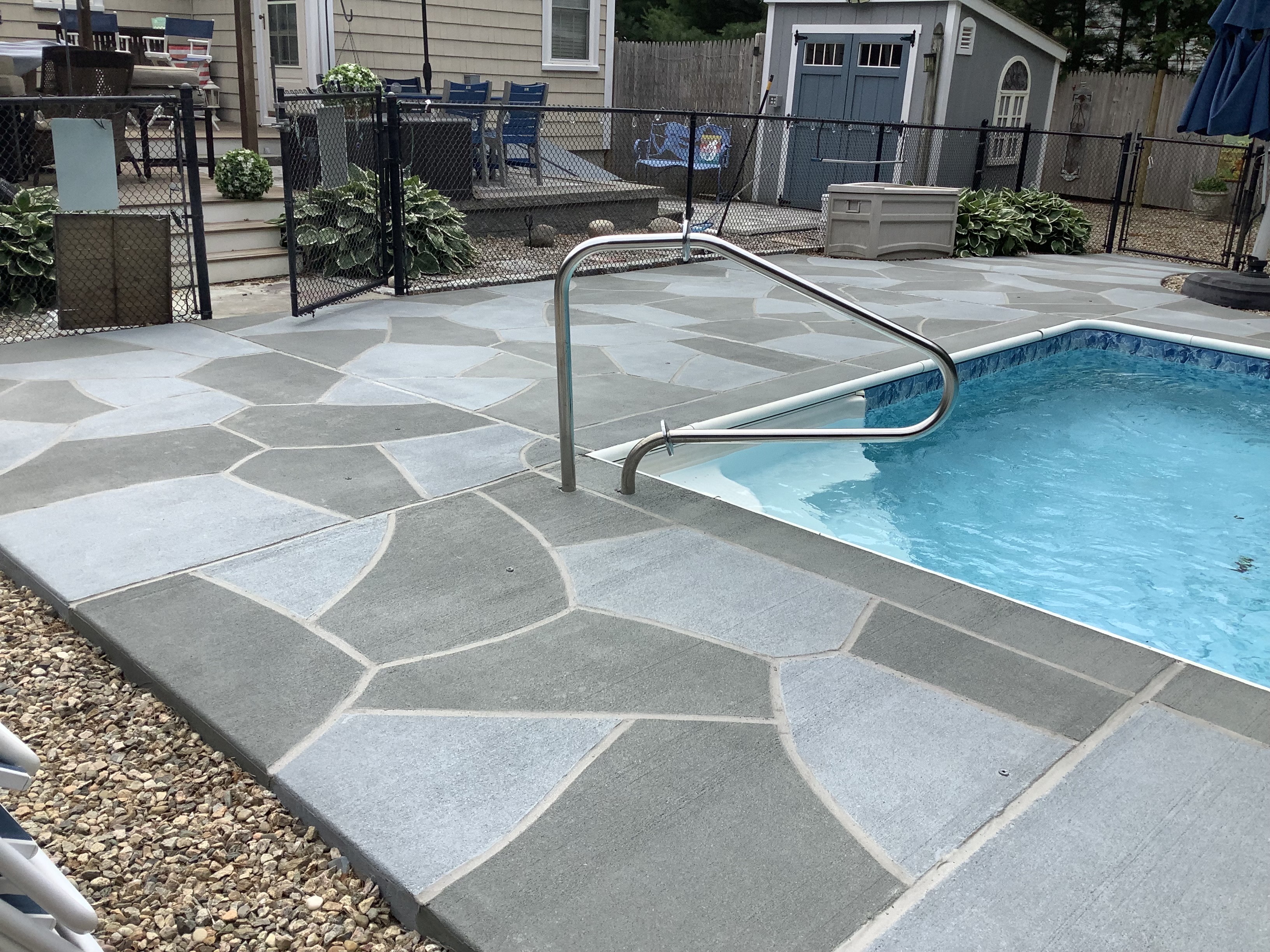 Granite Slate pool deck concrete repair and resurfacing project.