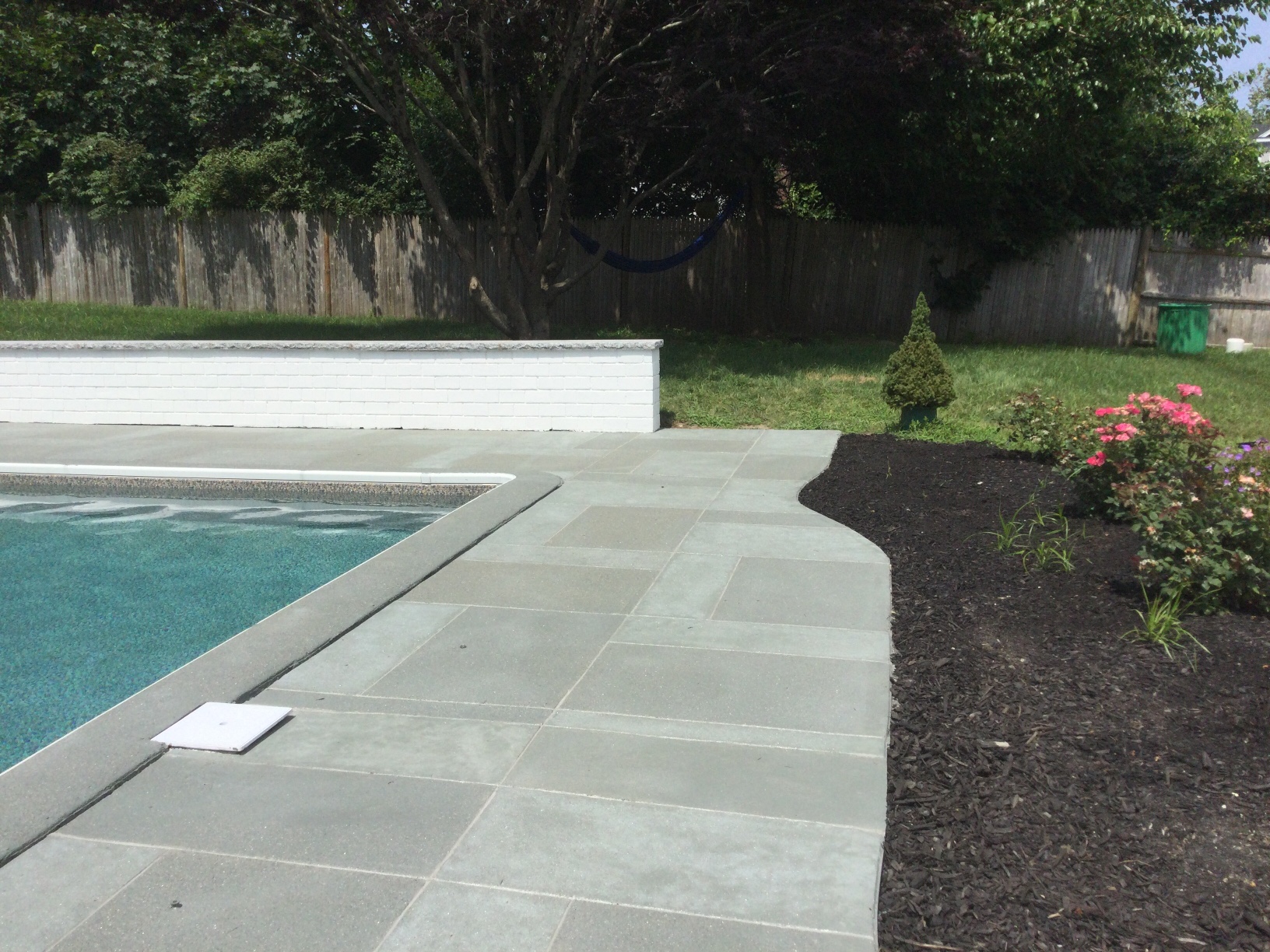Granite Slate Tile Decorative Concrete Pool Deck Installation | RenuKrete