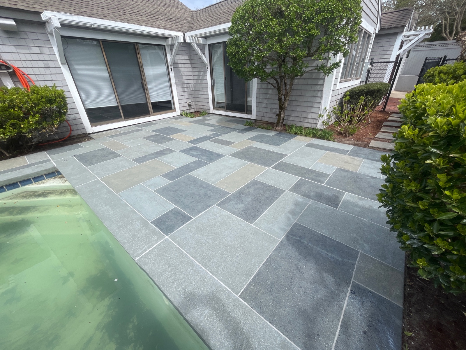 Residential pool deck renovation in Granite Slate finish - updated ...