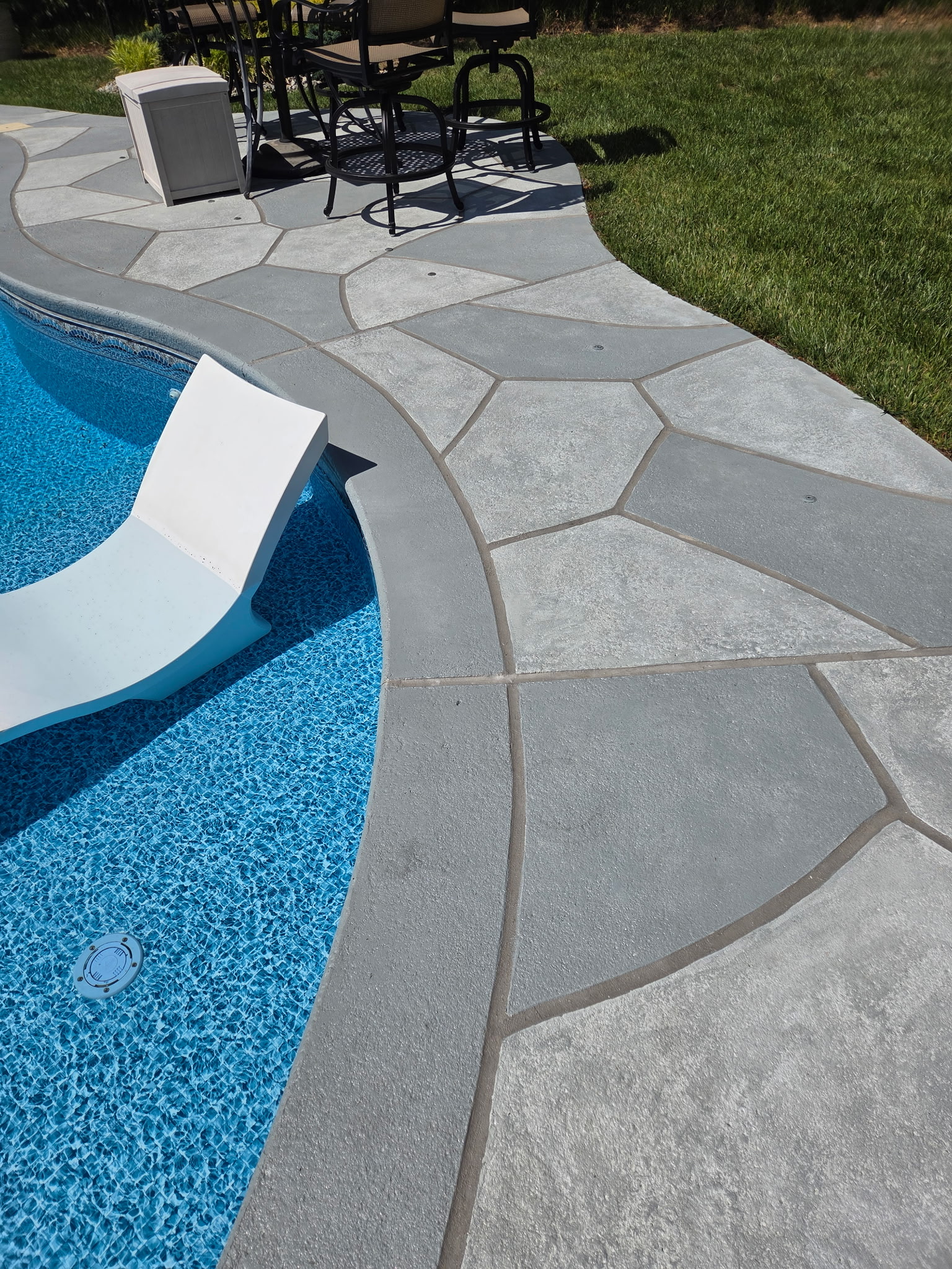 Granite Slate pool deck concrete repair and resurfacing project.