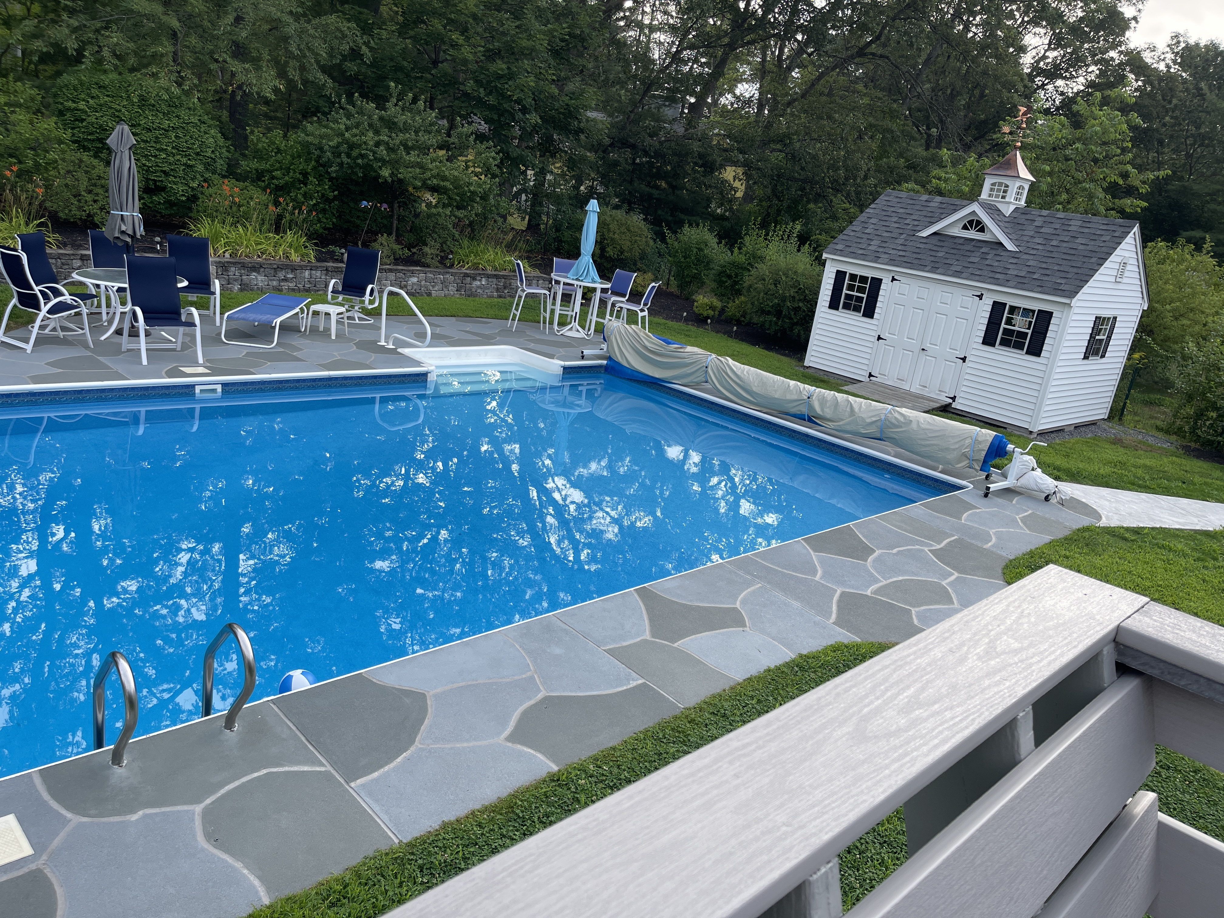 Granite Slate pool deck concrete repair and resurfacing project.