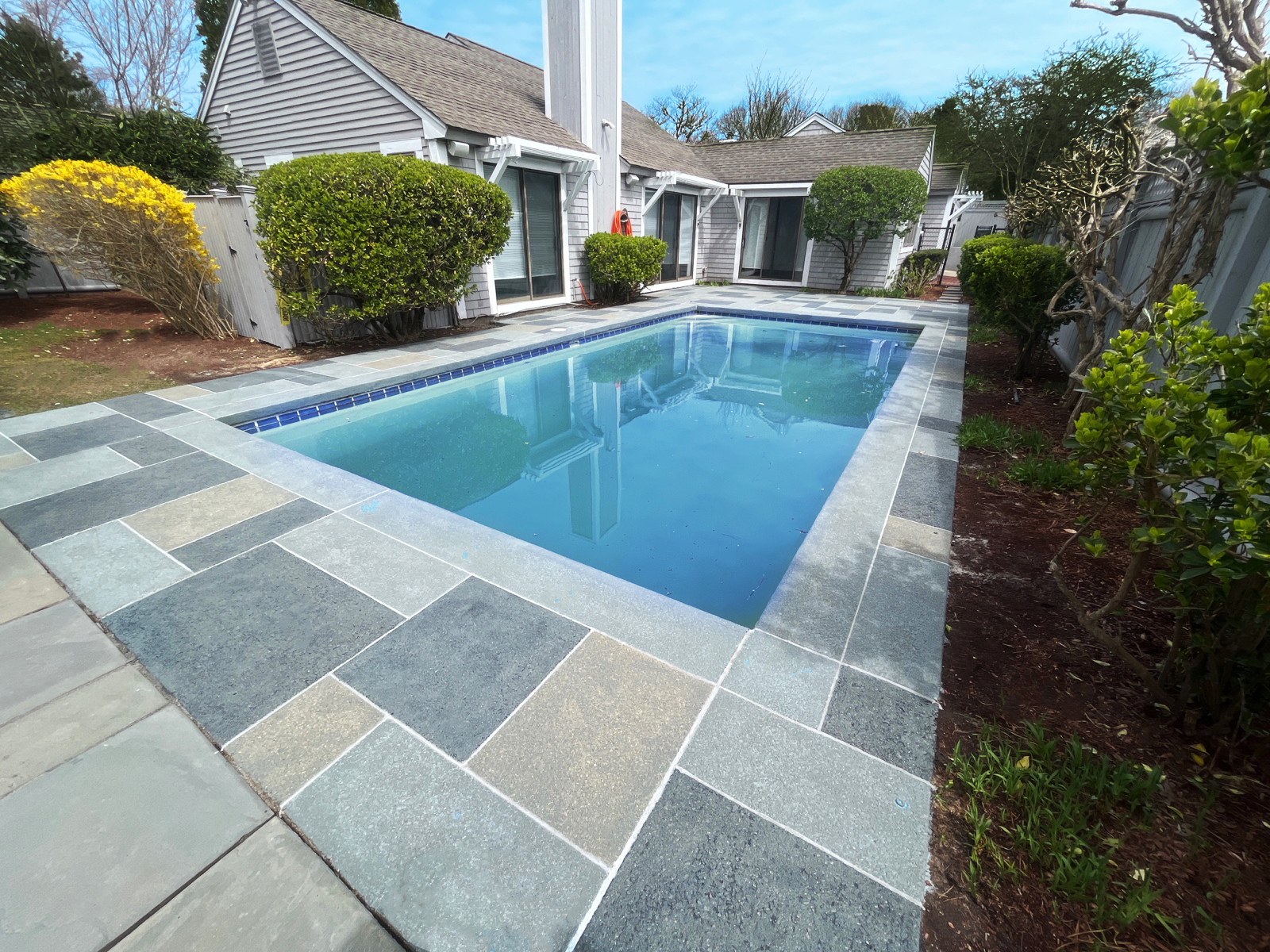 Granite Slate decorative concrete pool deck surface with stone inspired pattern.