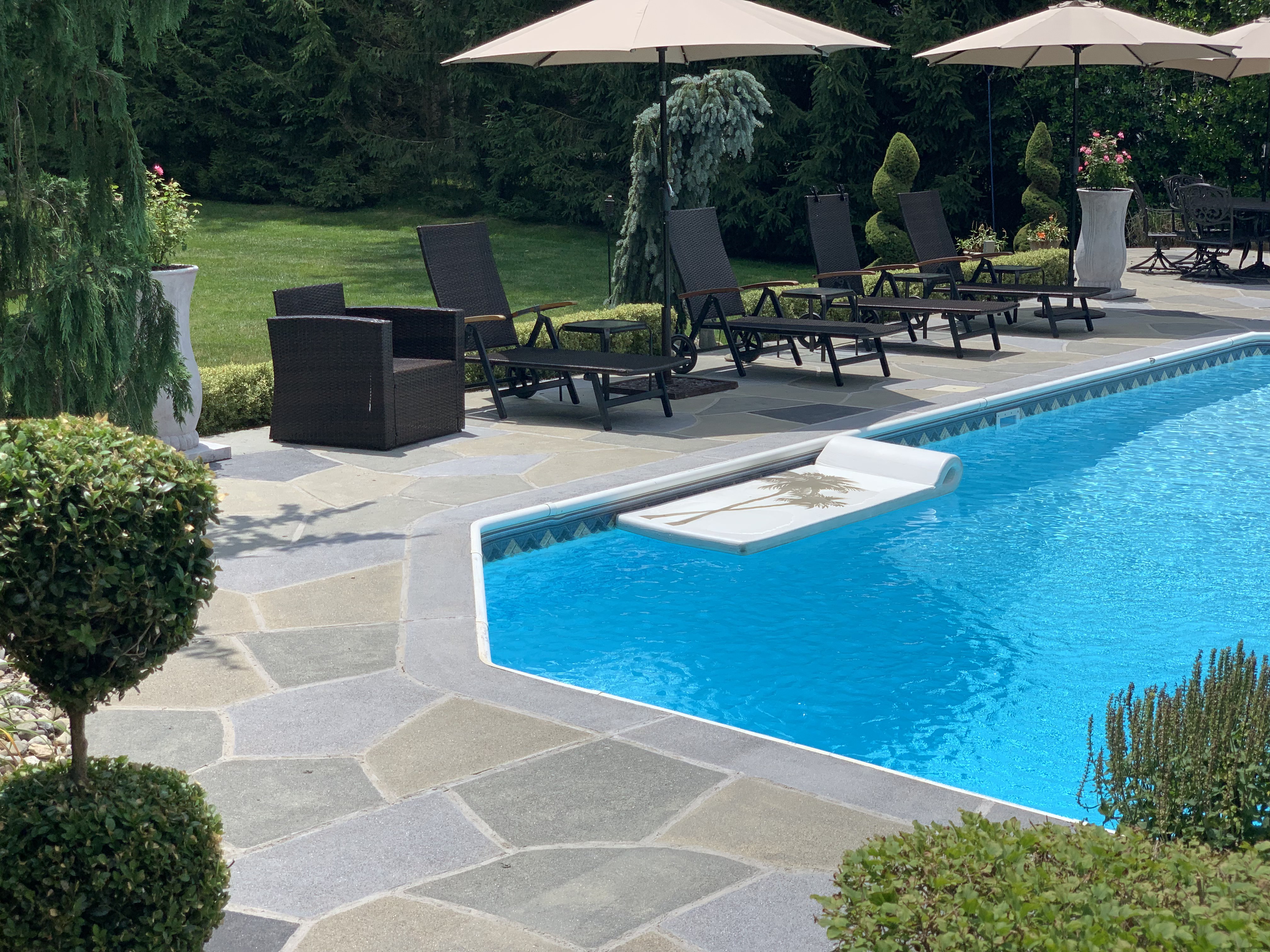 Granite Slate pool deck concrete resurfacing project with refined slate like texture.