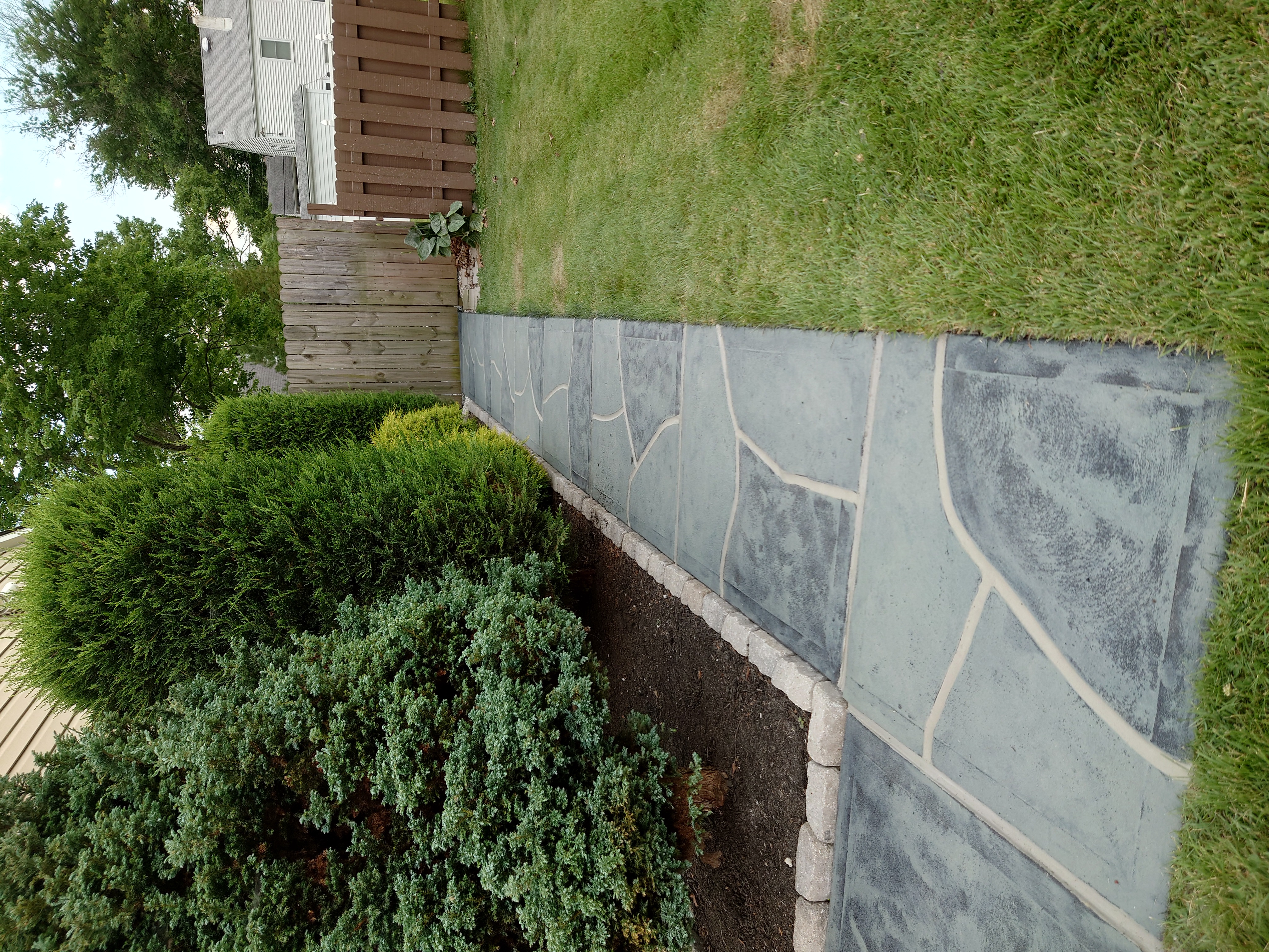 Residential pool deck in Granite Slate color theme in Princeton, NJ after concrete resurfacing.
