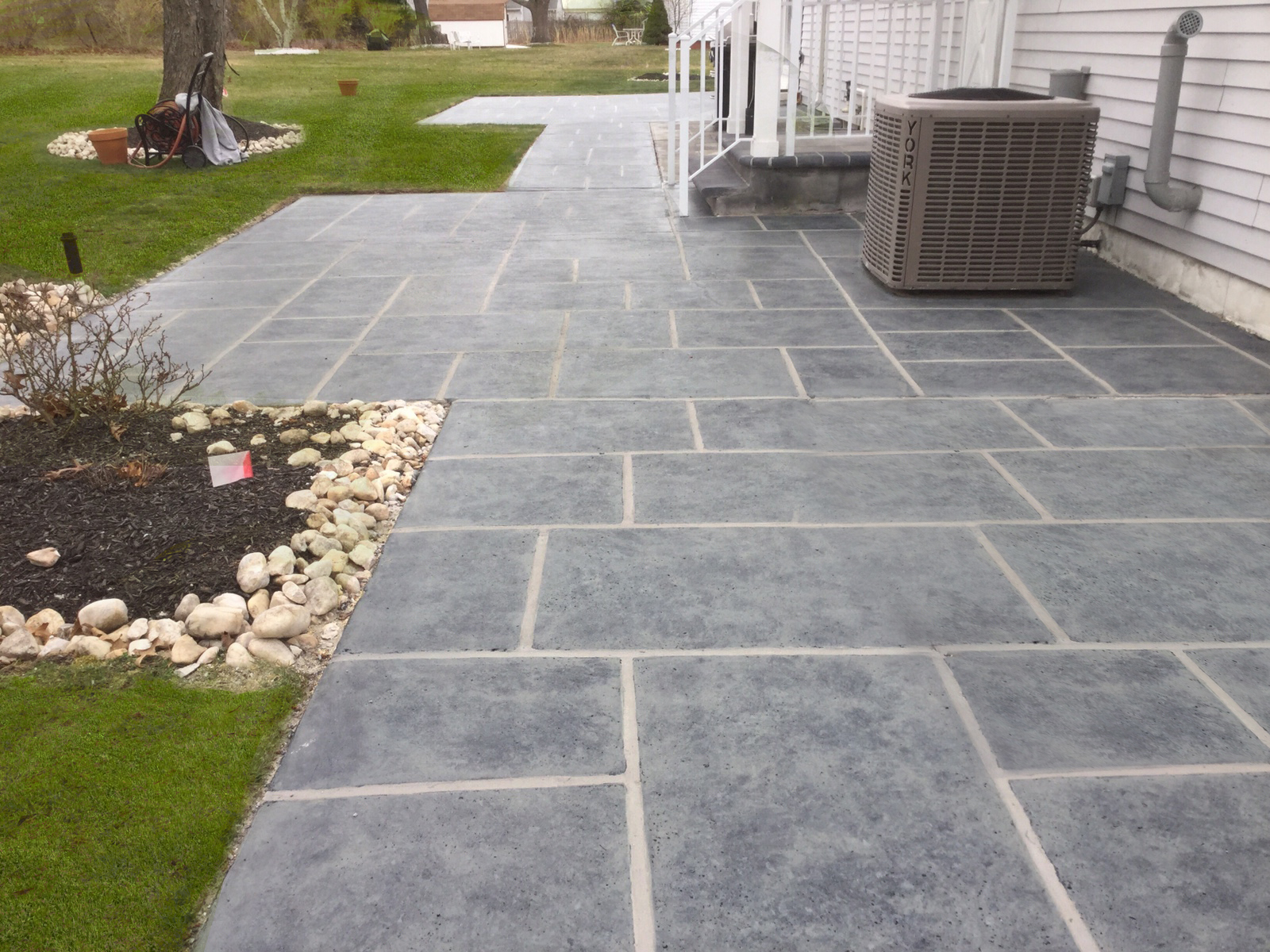 Granite Slate decorative concrete pool deck surface in Rockville, MD with stone inspired pattern.