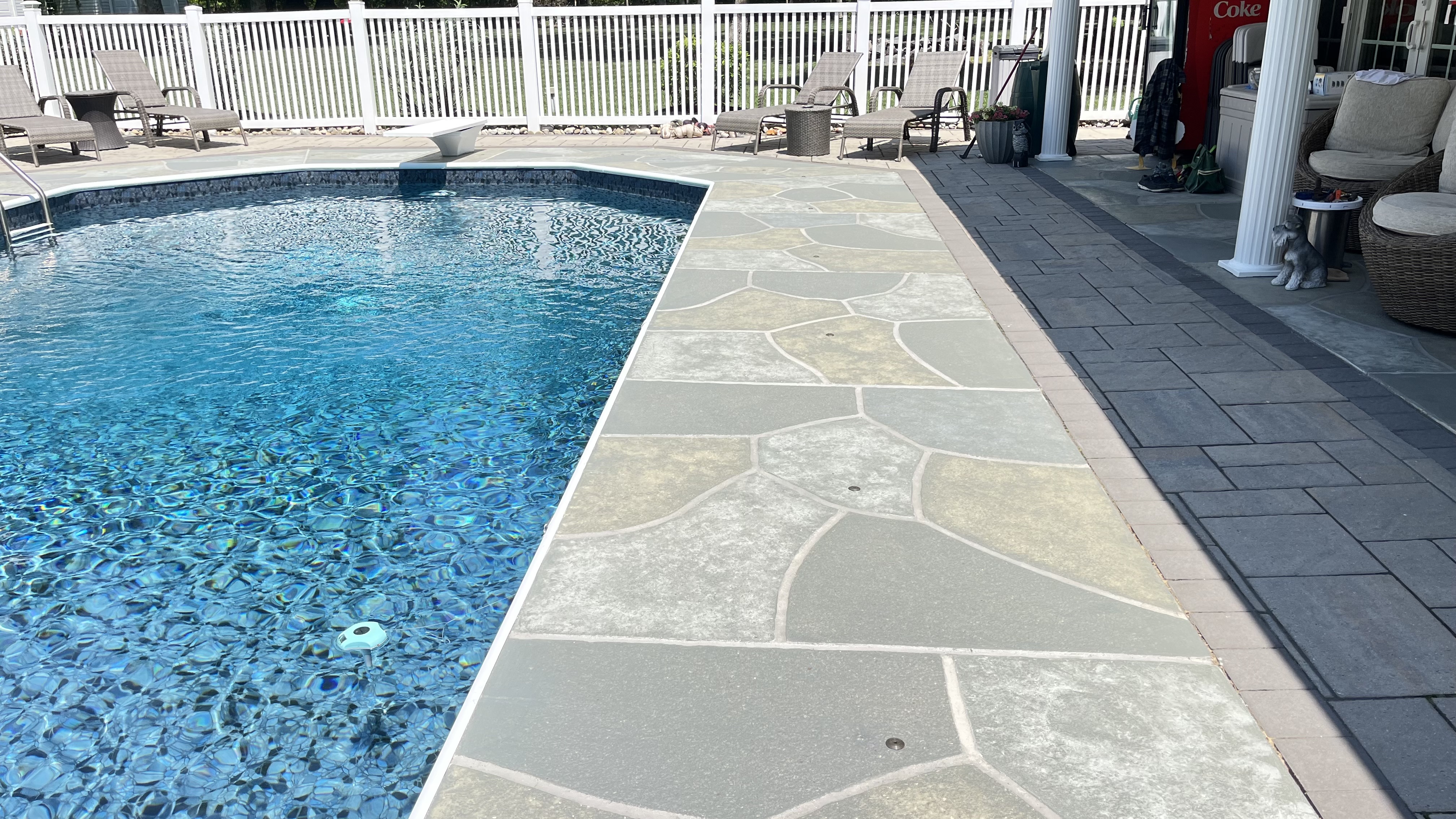 Granite Slate pool deck concrete repair and resurfacing project in Summit, NJ.