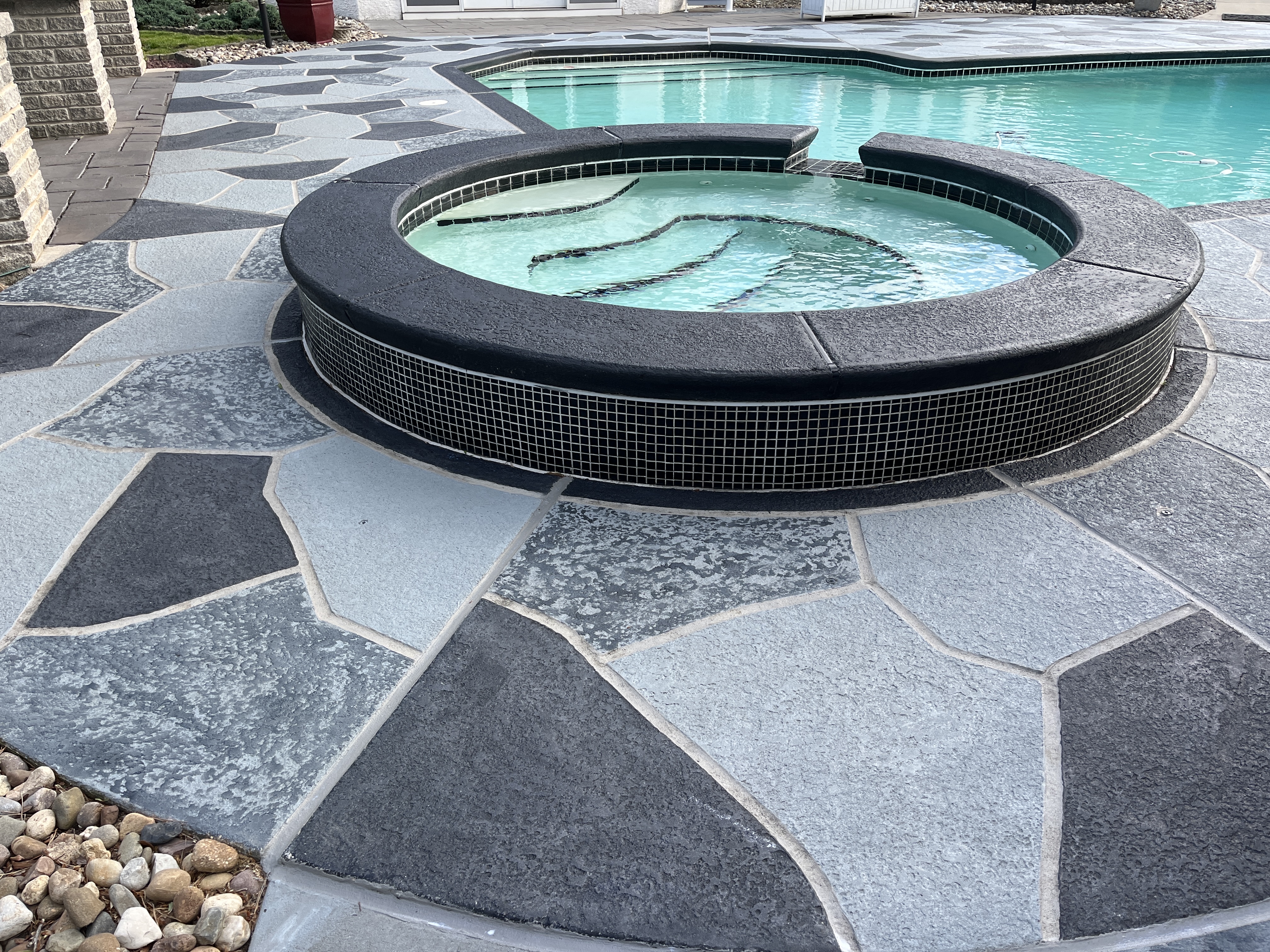 Granite Slate pool deck concrete resurfacing project in Annapolis, MD with refined slate like texture.
