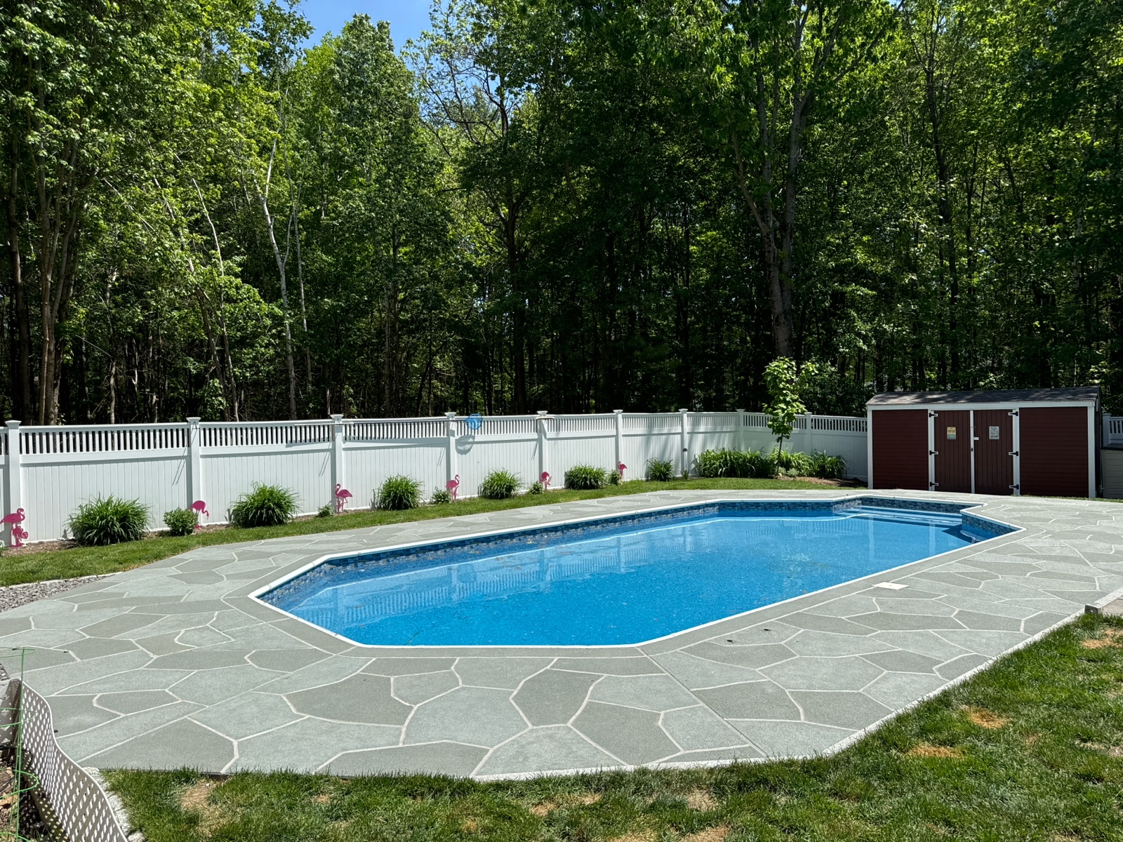 Granite Slate pool deck concrete repair and resurfacing project in Summit, NJ.