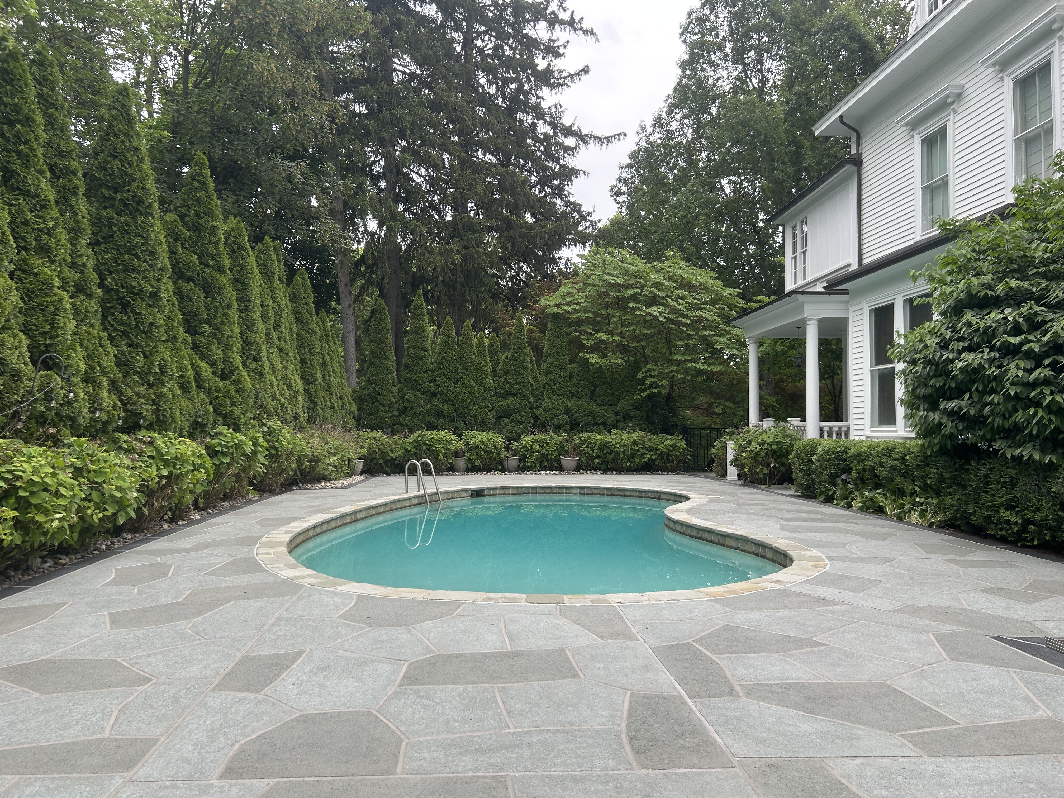 Granite Slate decorative concrete pool deck surface in Allentown, PA with stone inspired pattern.