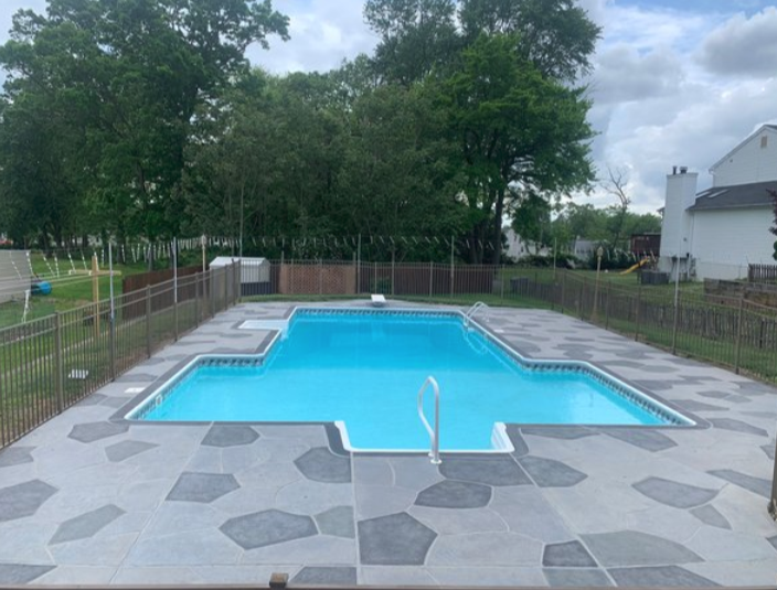 Granite Slate decorative concrete pool deck surface in Summit, NJ with stone inspired pattern.