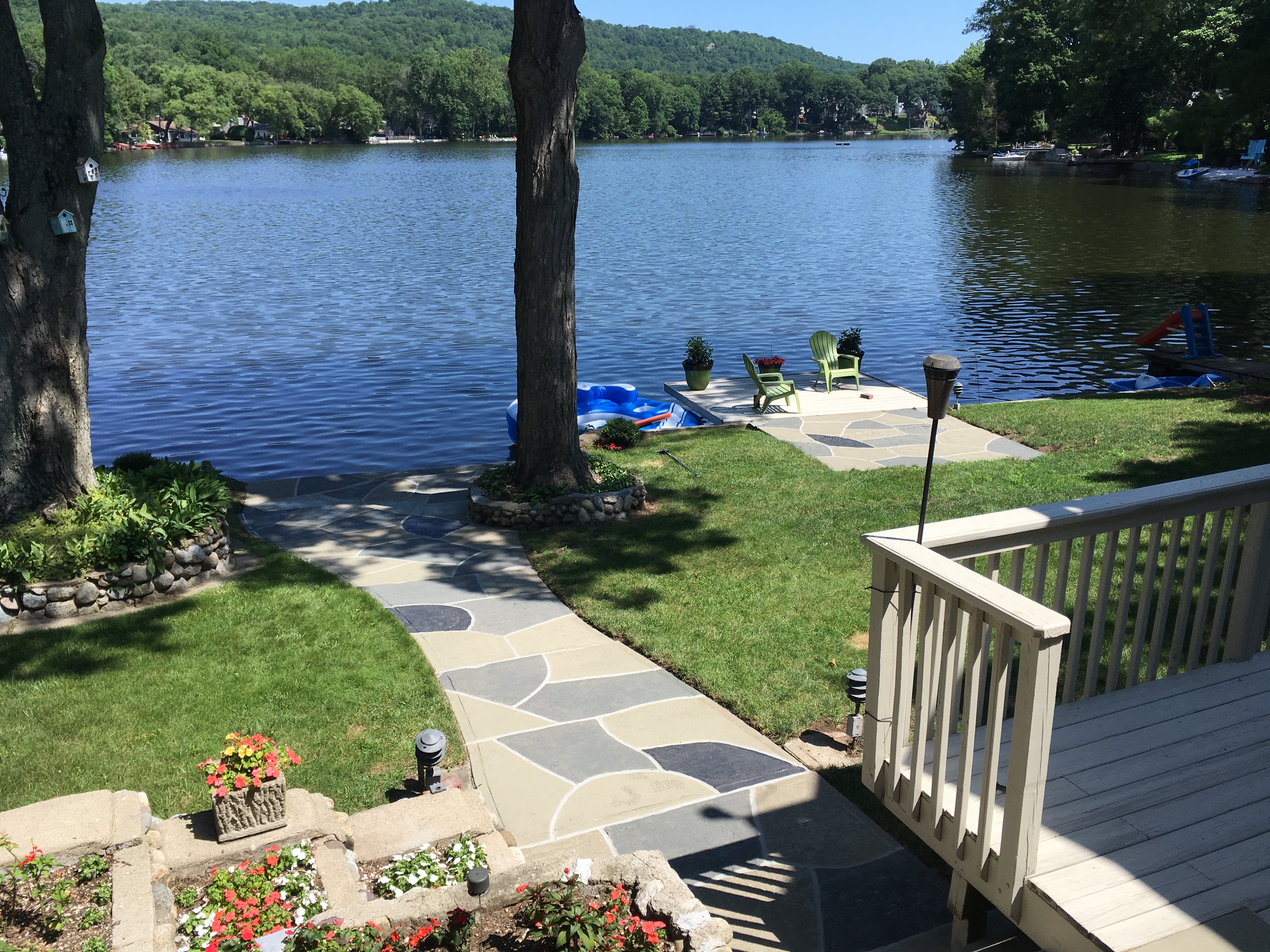 Residential pool deck in Granite Slate color theme in Princeton, NJ after concrete resurfacing.