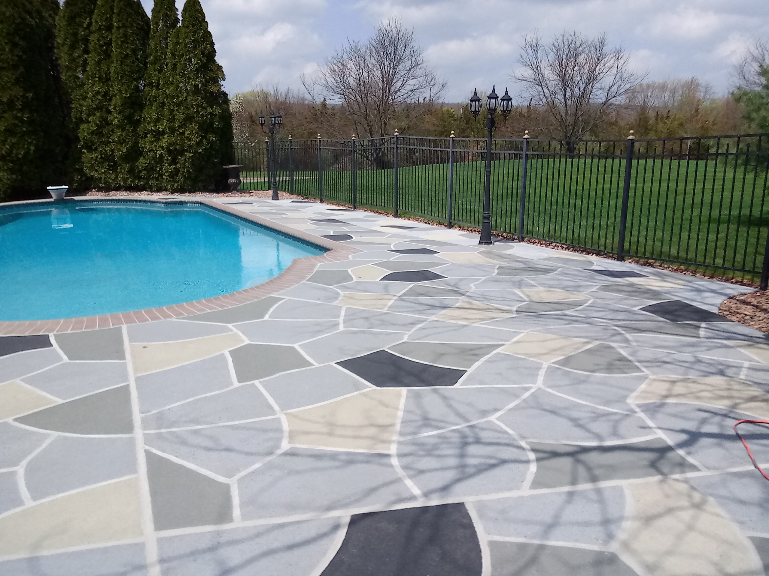 Granite Slate pool deck concrete repair and resurfacing project in Marlton, NJ.