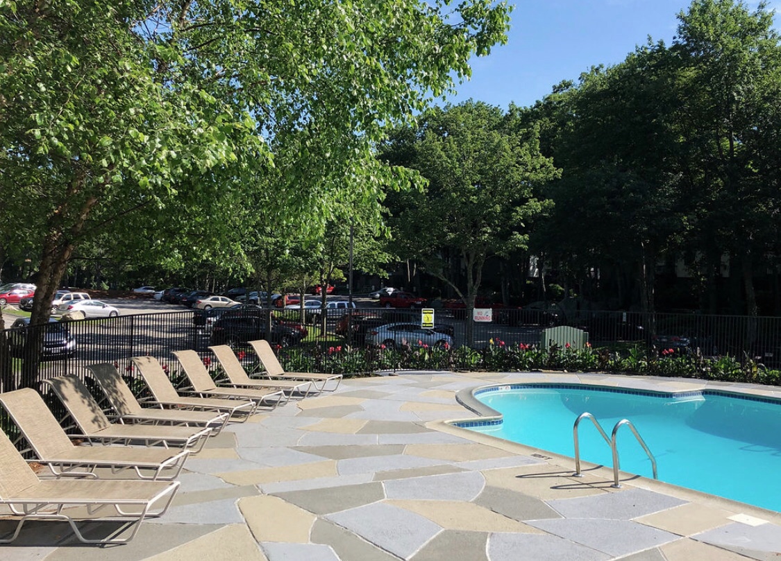 Granite Slate decorative concrete pool deck surface with stone inspired pattern.