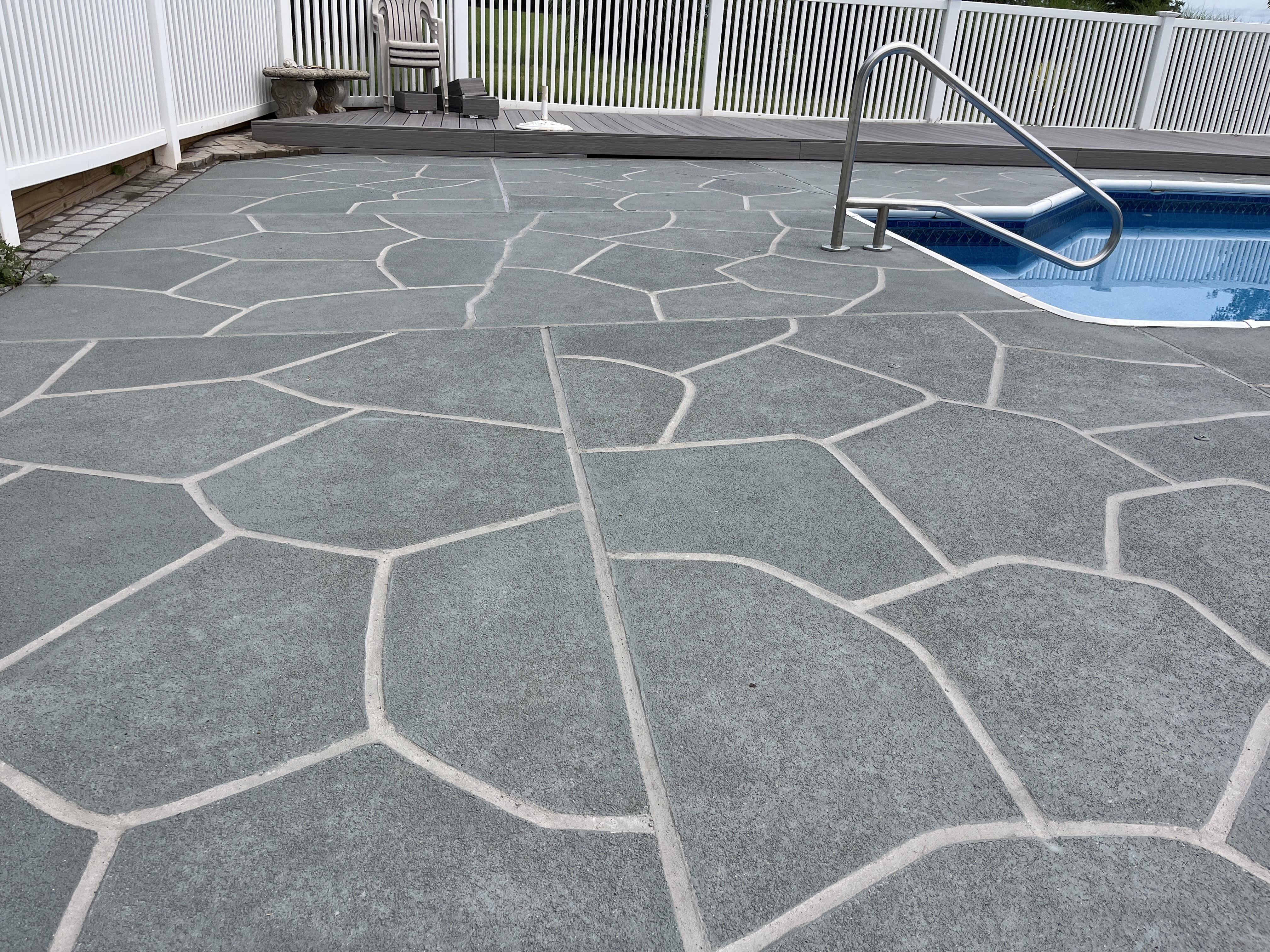 Granite Slate pool deck concrete repair and resurfacing project.