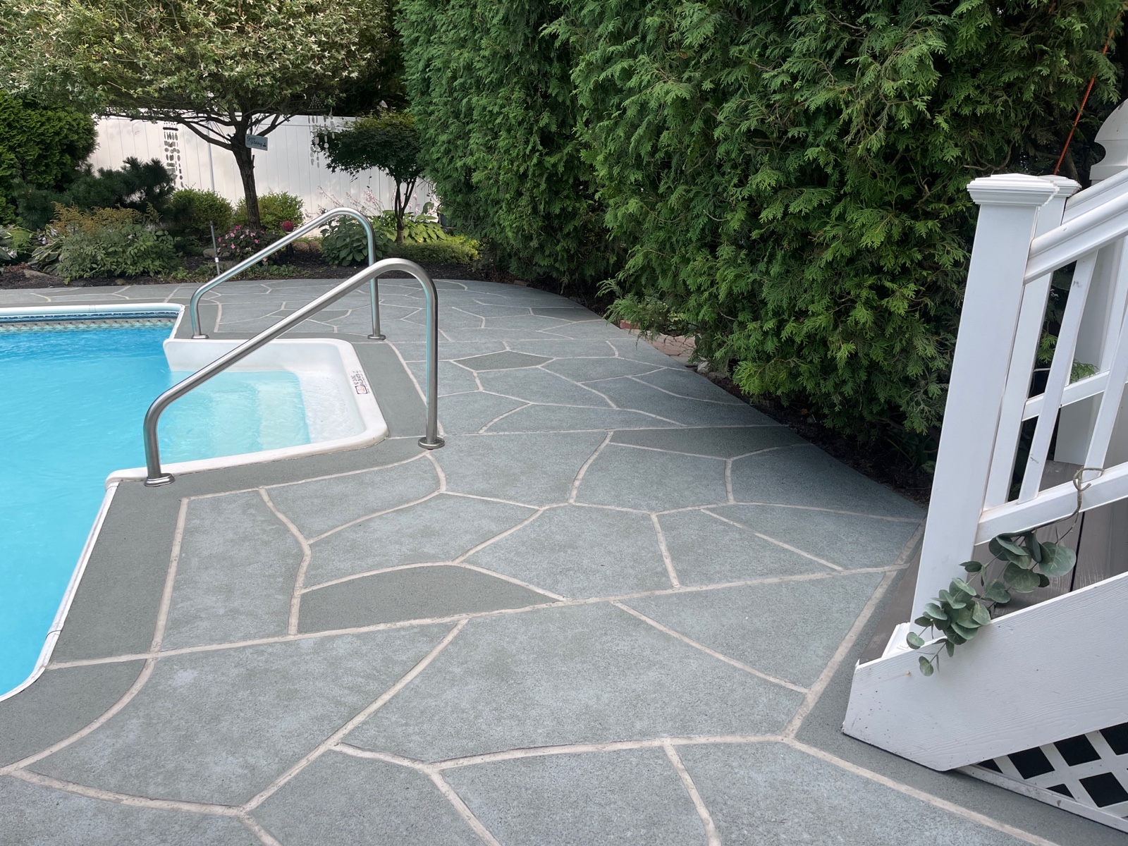 Granite Slate decorative concrete pool deck surface with stone inspired pattern.