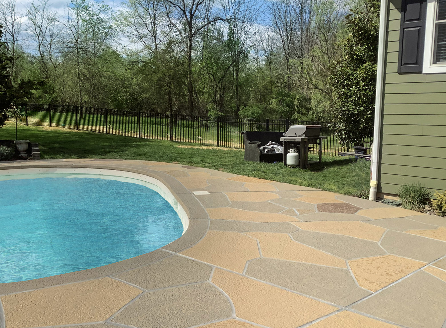 Pool deck resurfaced in Hurricane Slate finish with refined surface texture
