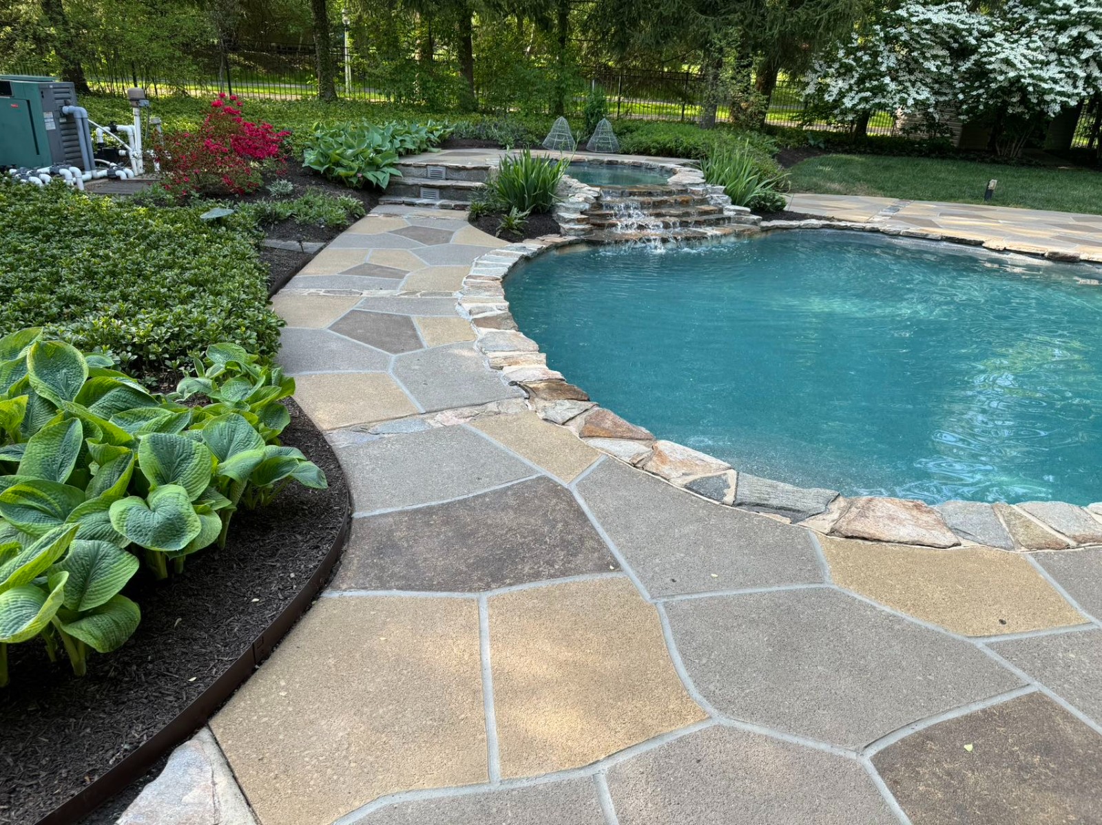 Modern Hurricane Slate pool deck renovation displaying modern slate-like aesthetic