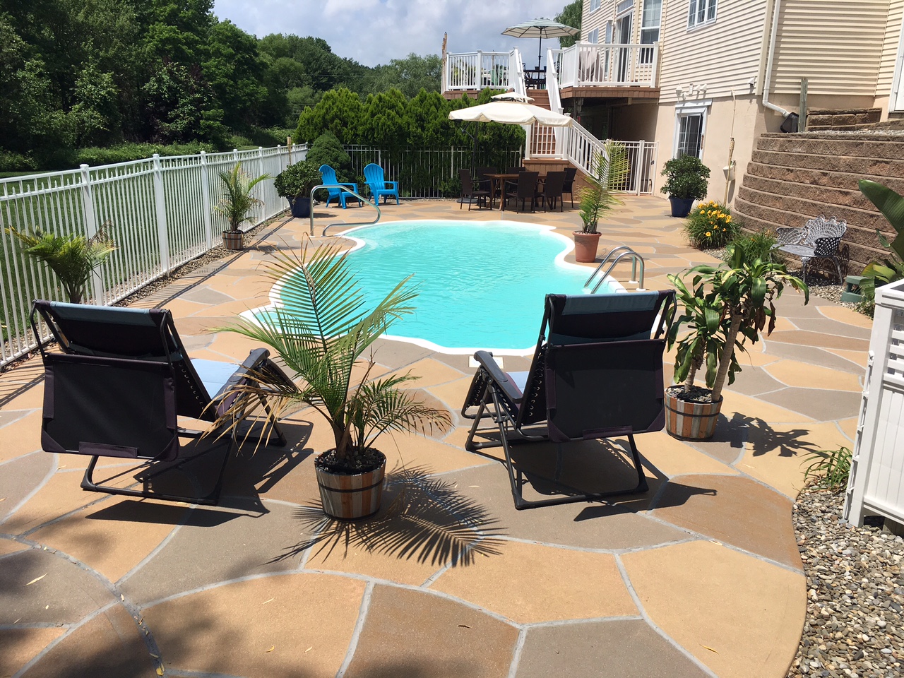 Hurricane Slate concrete pool deck repair featuring durable resurfaced concrete