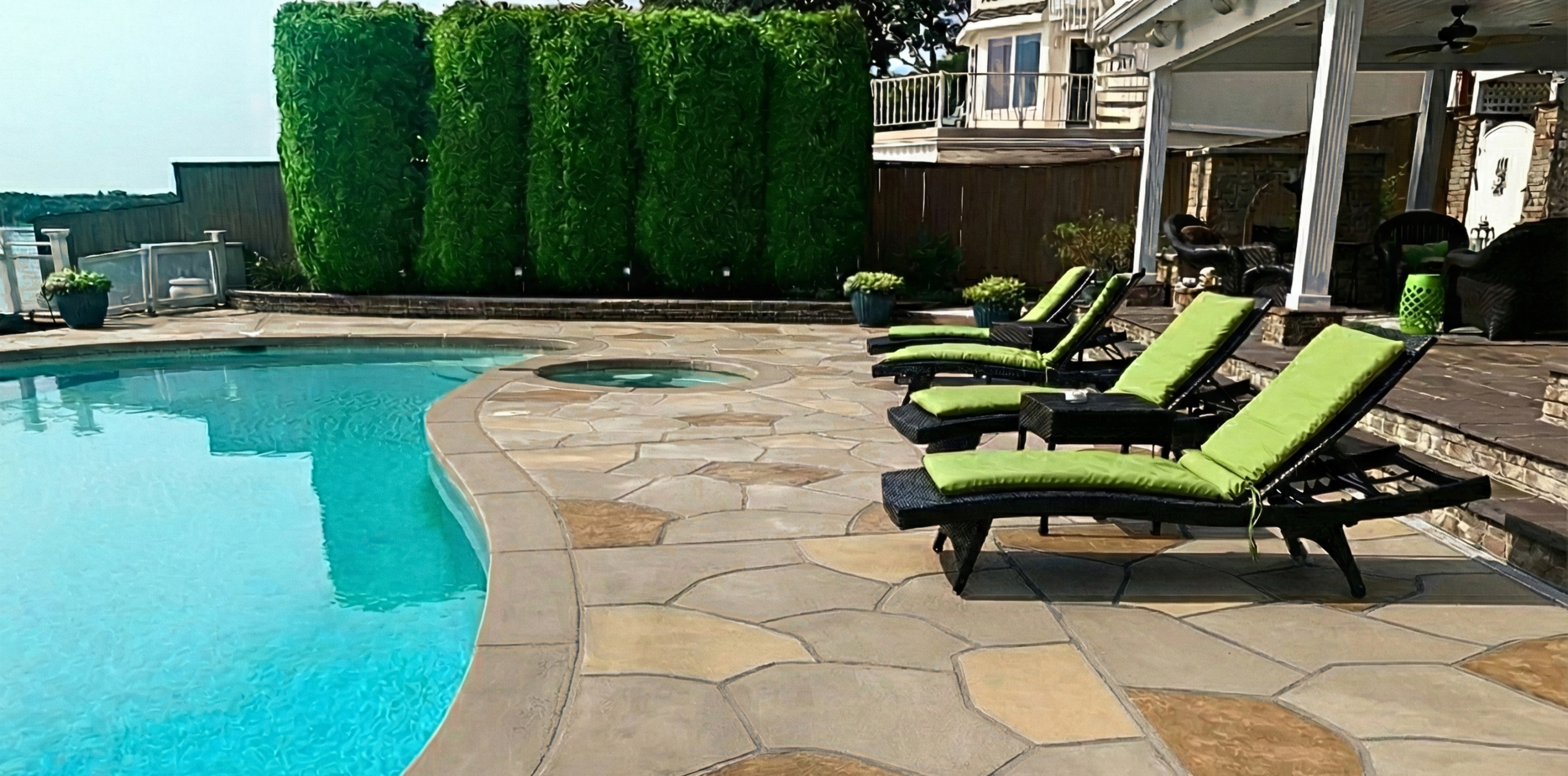 RenuKrete resurfaced pool deck in Hurricane Slate showing modern slate-like aesthetic in Princeton, NJ