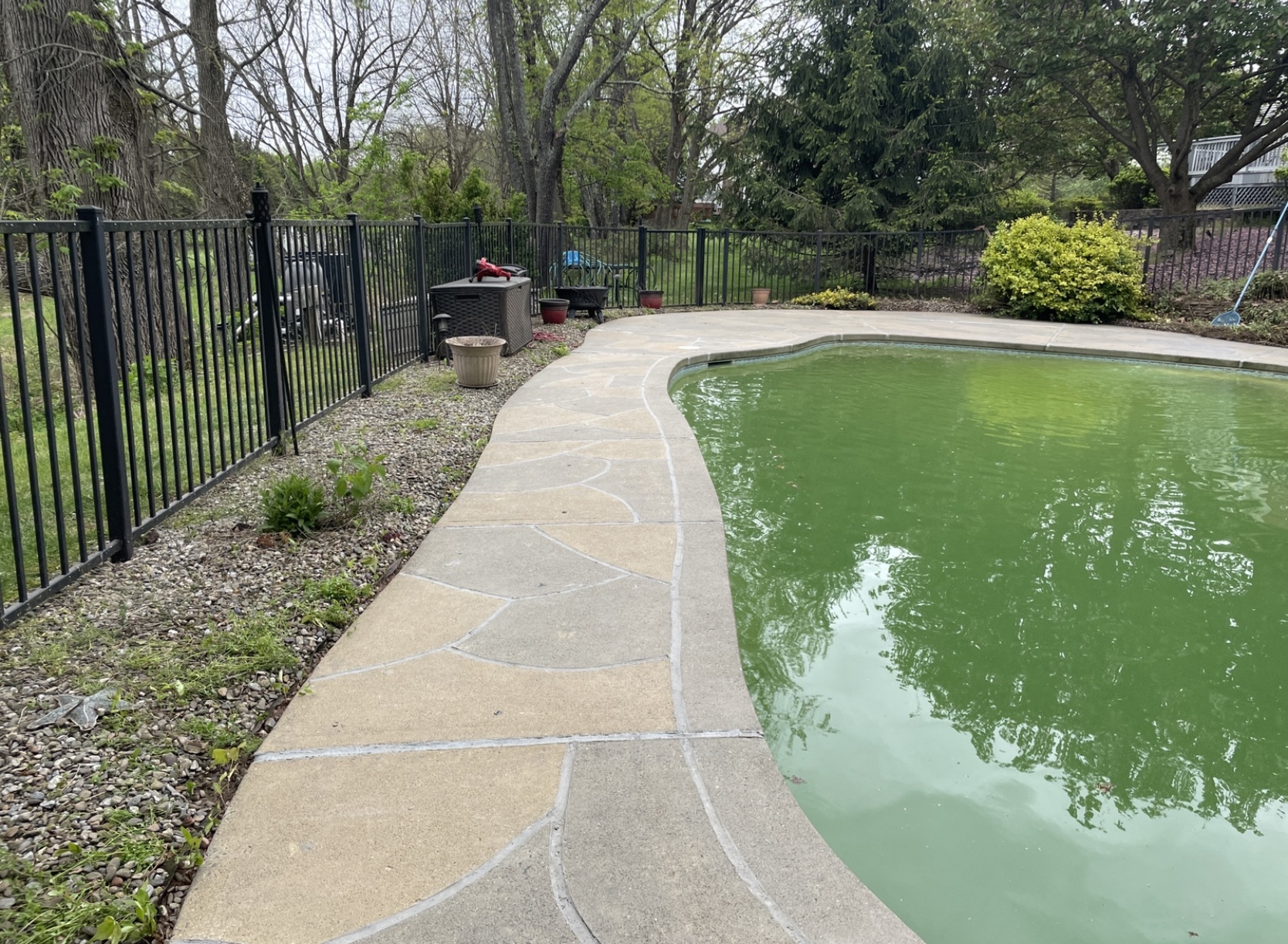 Pool deck resurfaced in Hurricane Slate finish with refined surface texture