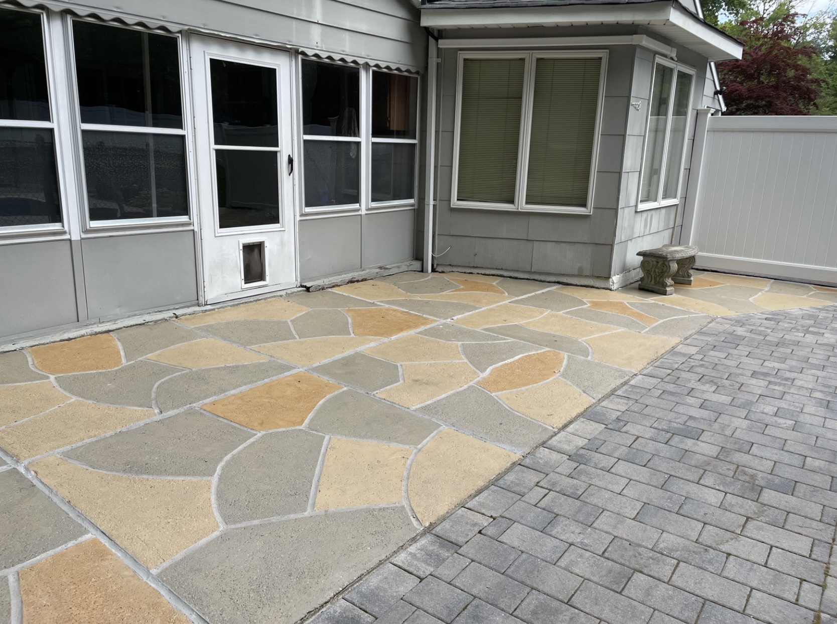 Pool deck resurfaced in Hurricane Slate finish with textured slate-like pattern in Rockville, MD