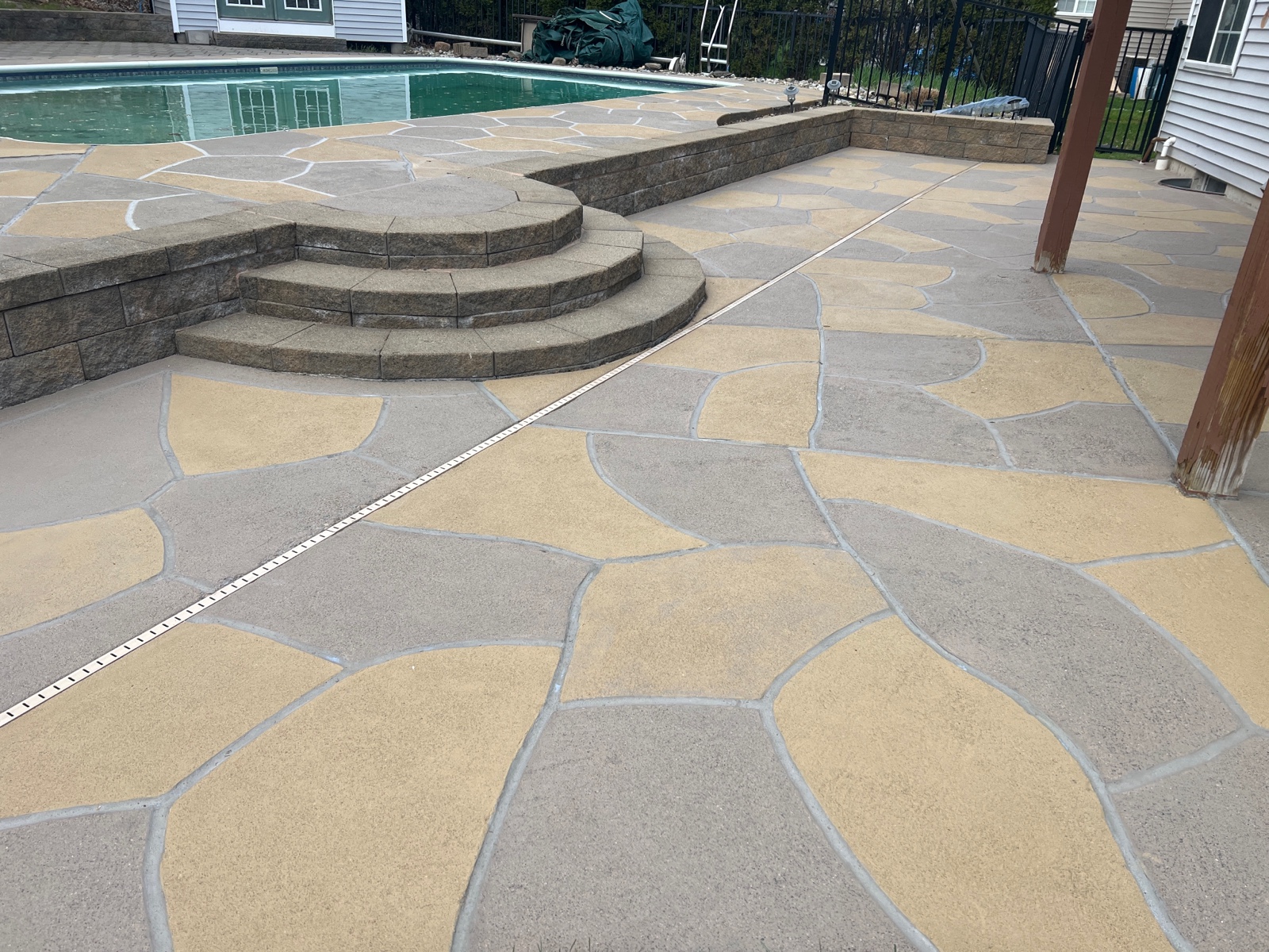 Hurricane Slate concrete pool deck repair featuring durable resurfaced concrete