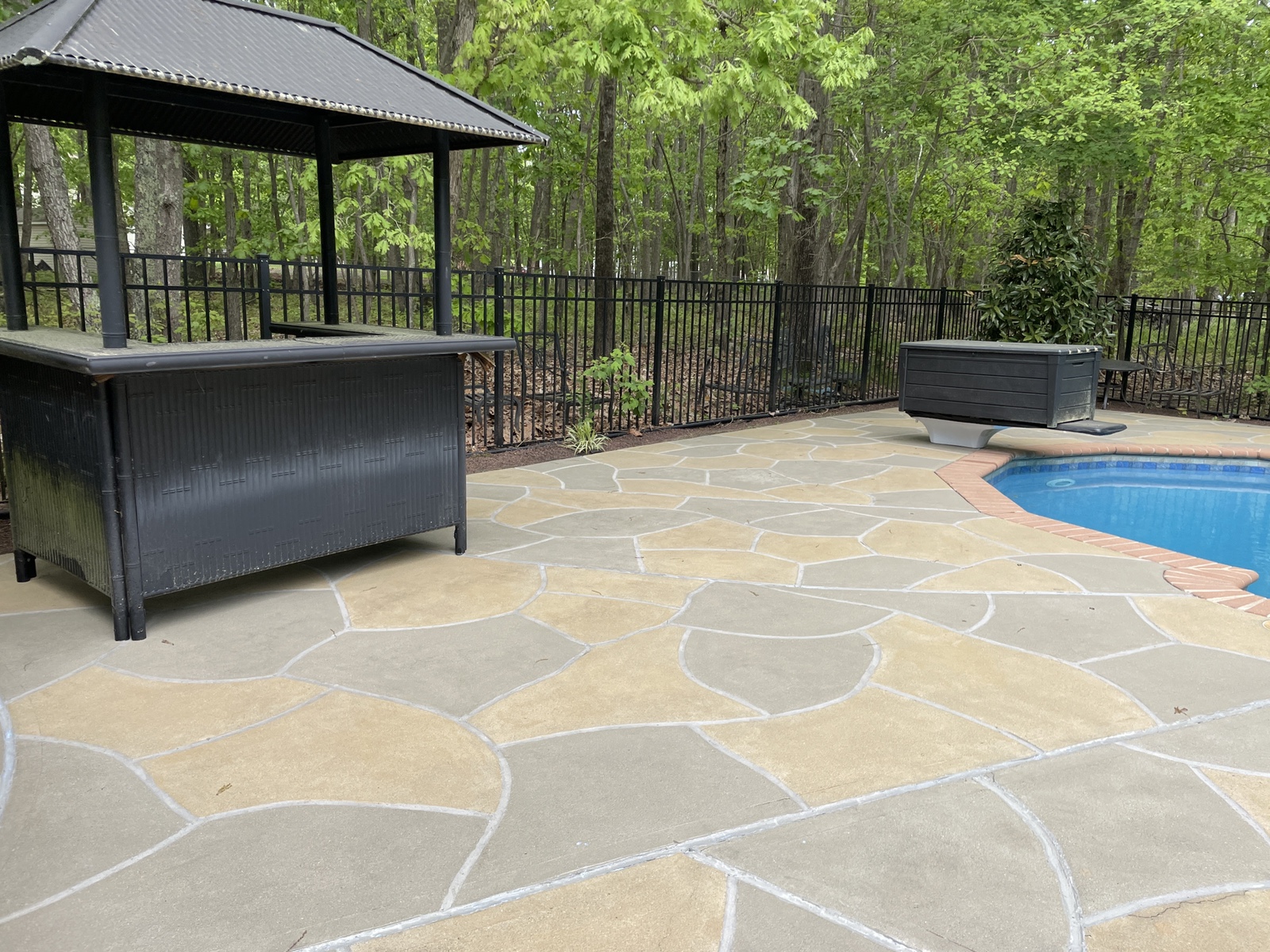 Modern Hurricane Slate pool deck renovation displaying modern slate-like aesthetic