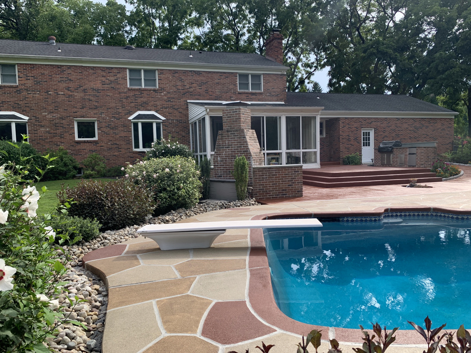 RenuKrete resurfaced pool deck in Hurricane Slate showing refined surface texture in Summit, NJ