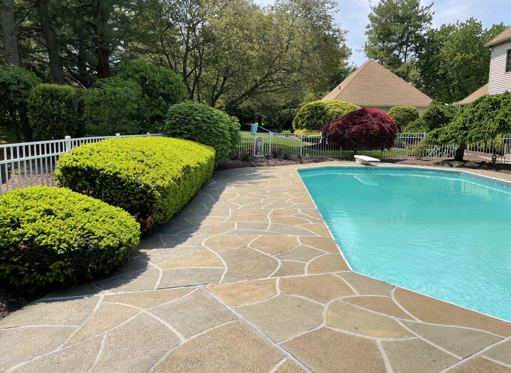 Hurricane Slate concrete pool deck repair featuring deep gray stone tones
