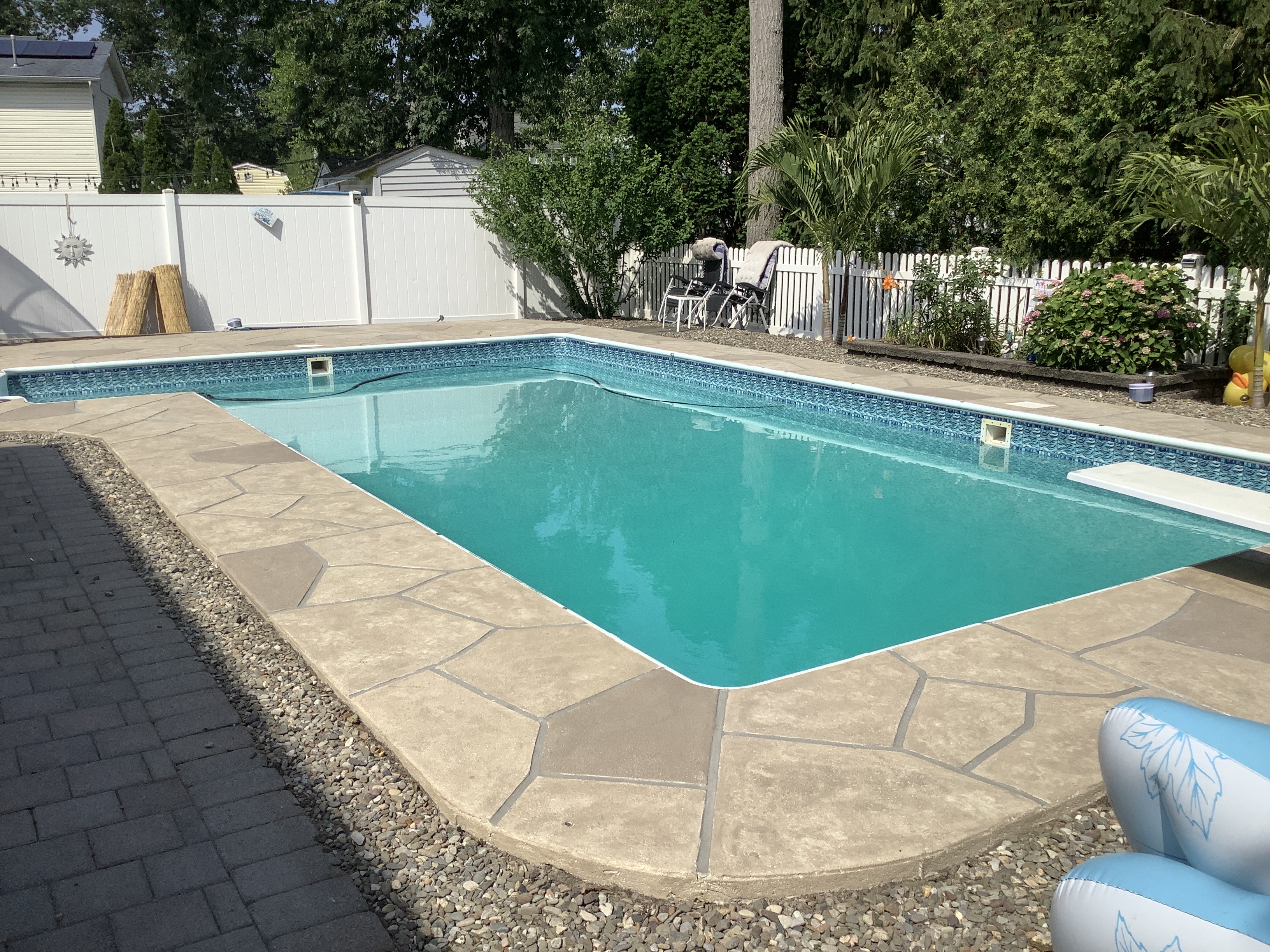 Pool deck resurfaced in Sandstone finish with subtle textured pattern