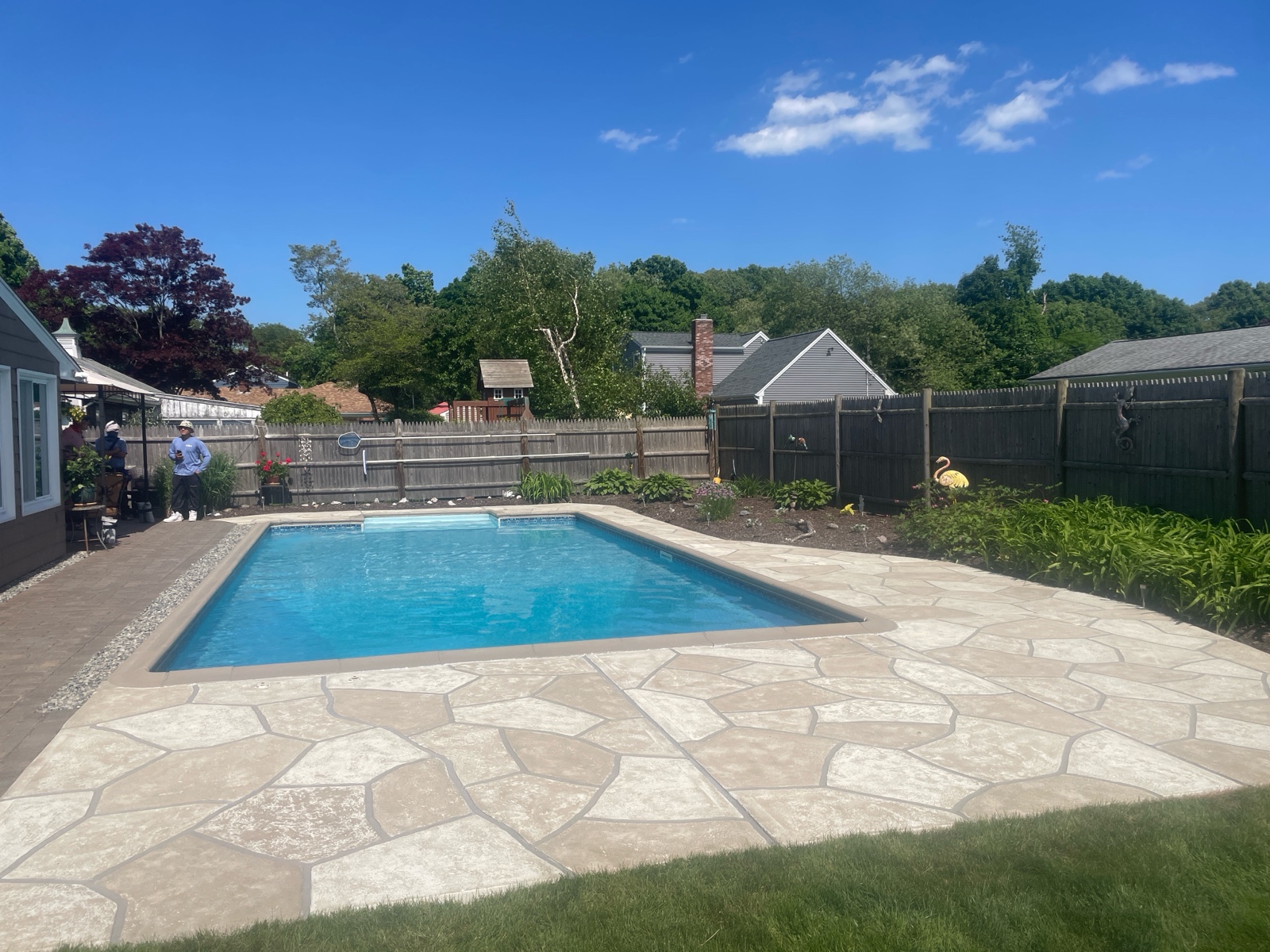 Warm-toned Sandstone pool deck renovation displaying subtle textured pattern