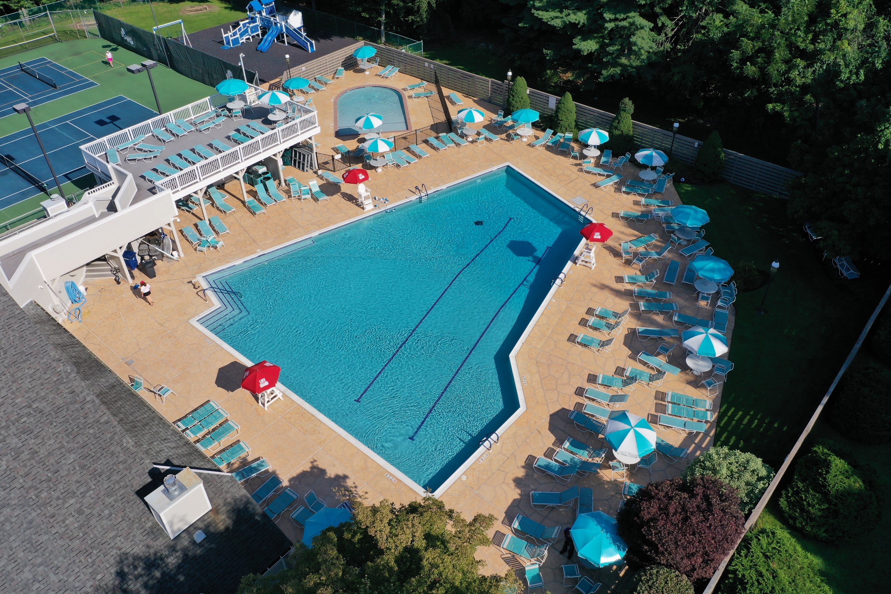 RenuKrete Tuscany-style resurfaced pool deck featuring warm earth tones