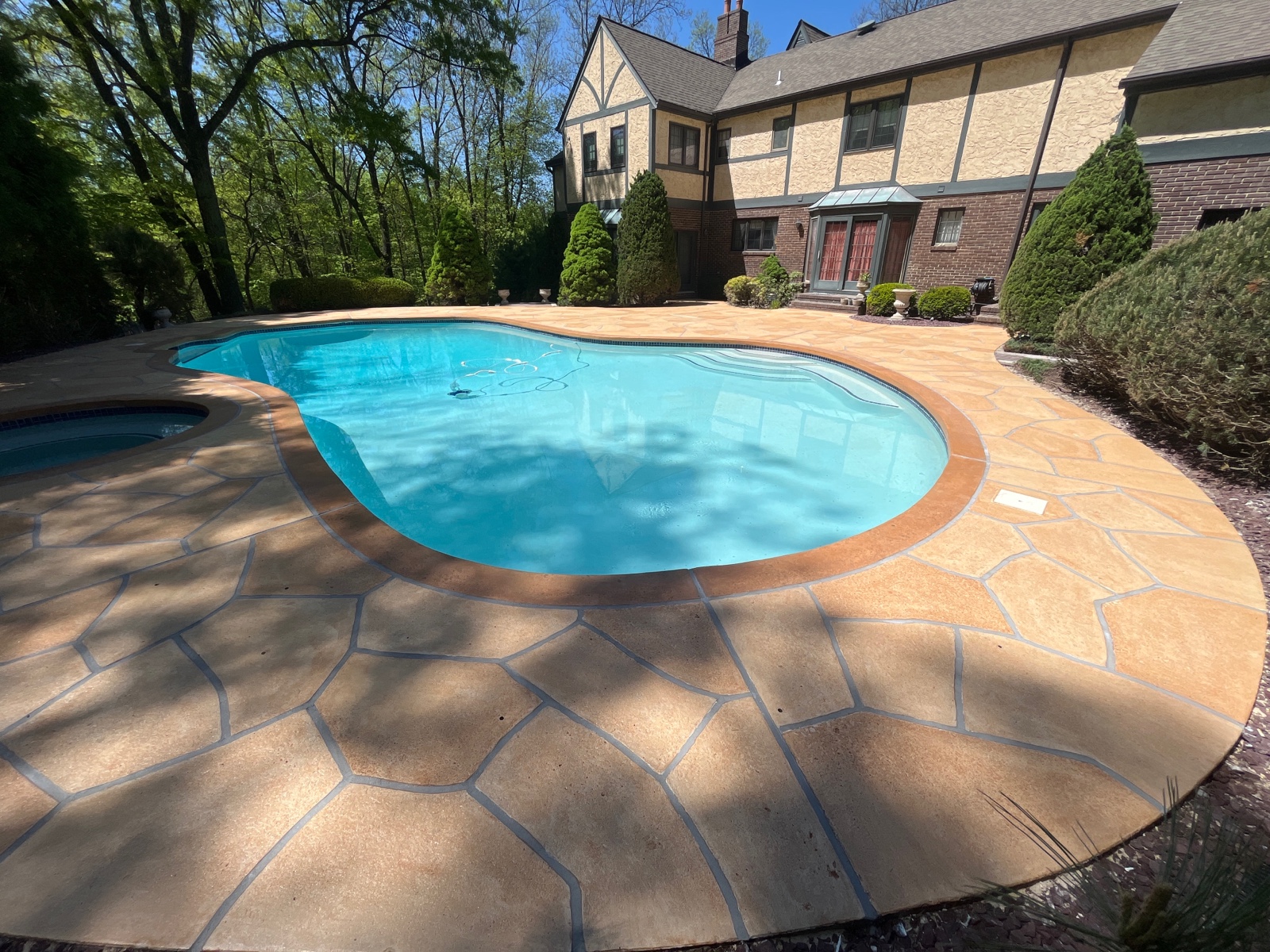 Tuscany concrete pool deck repair with enhanced aesthetic detail in Annapolis, MD