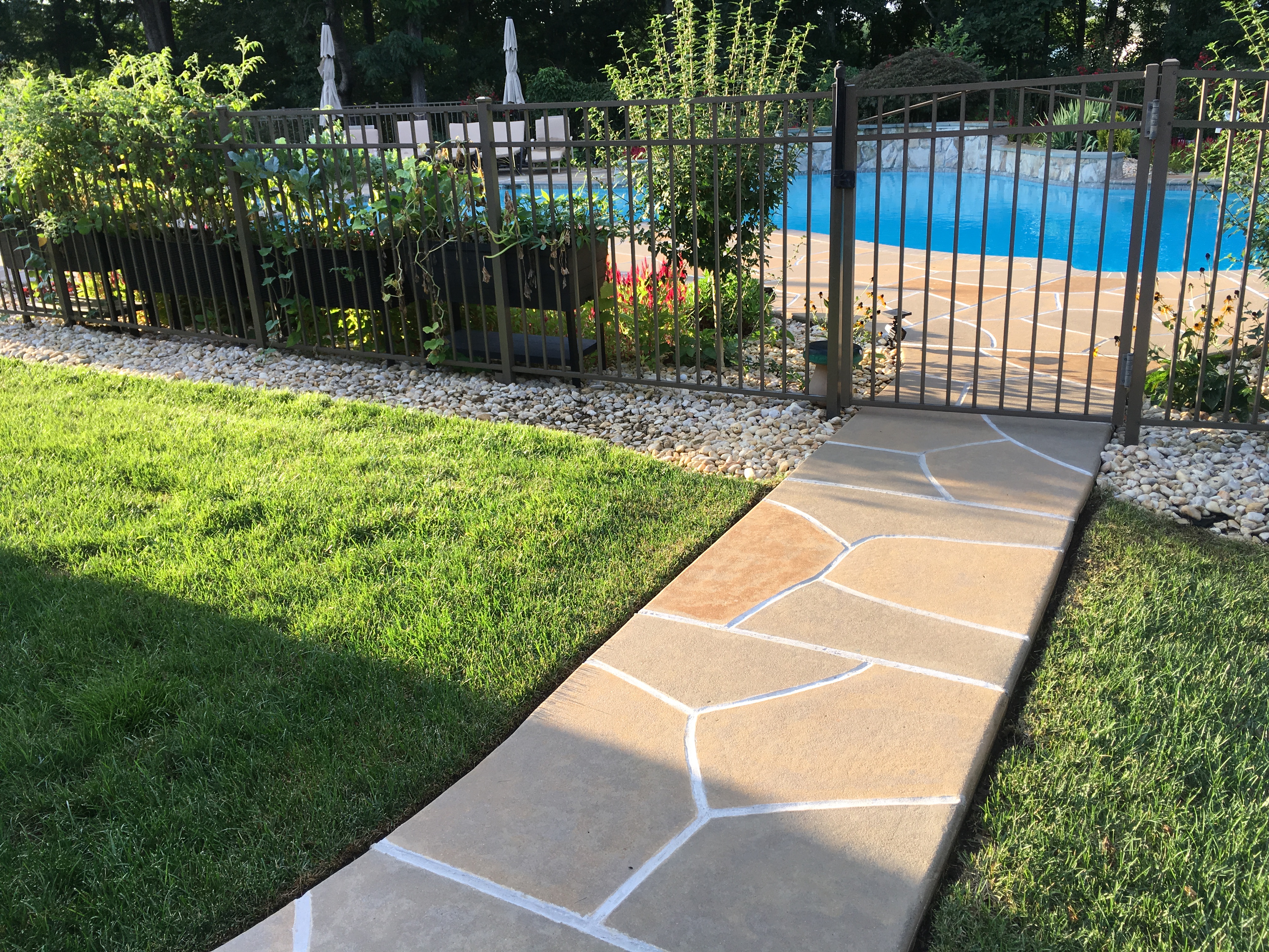 Tuscany concrete pool deck repair with durable resurfaced concrete