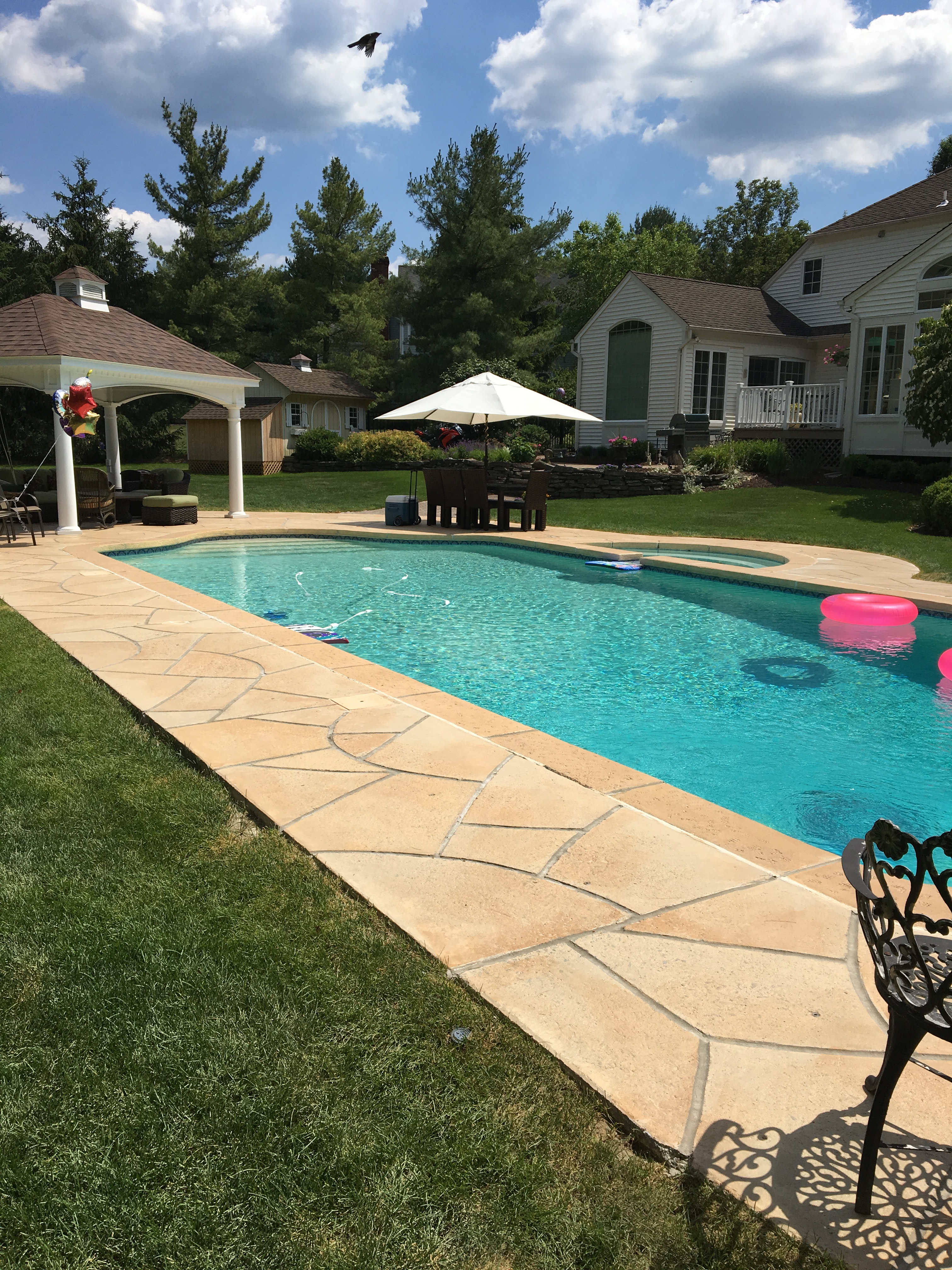 Tuscany concrete pool deck repair with stone-like texture