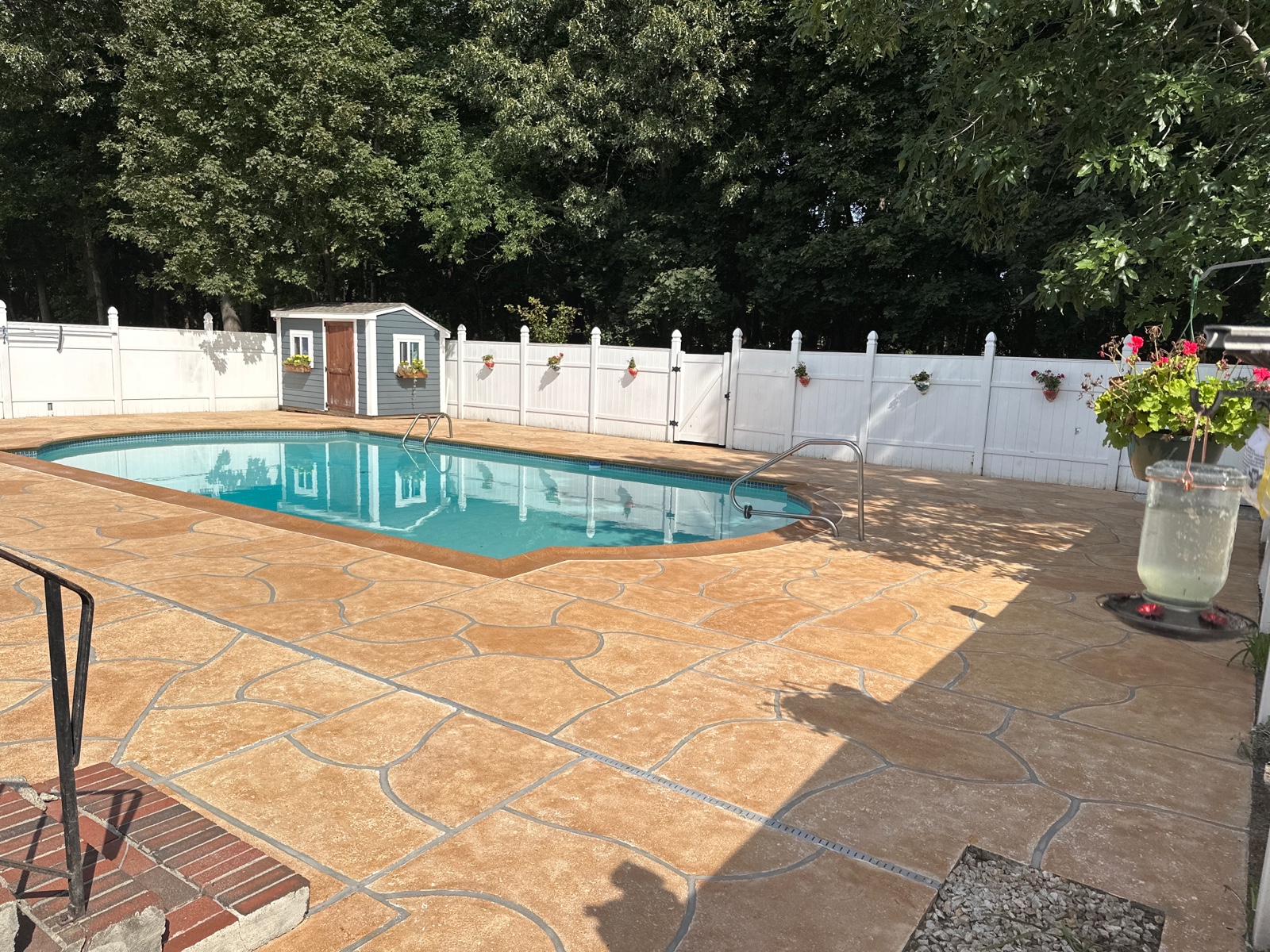 Pool deck resurfaced in Tuscany finish showing subtle textured surface